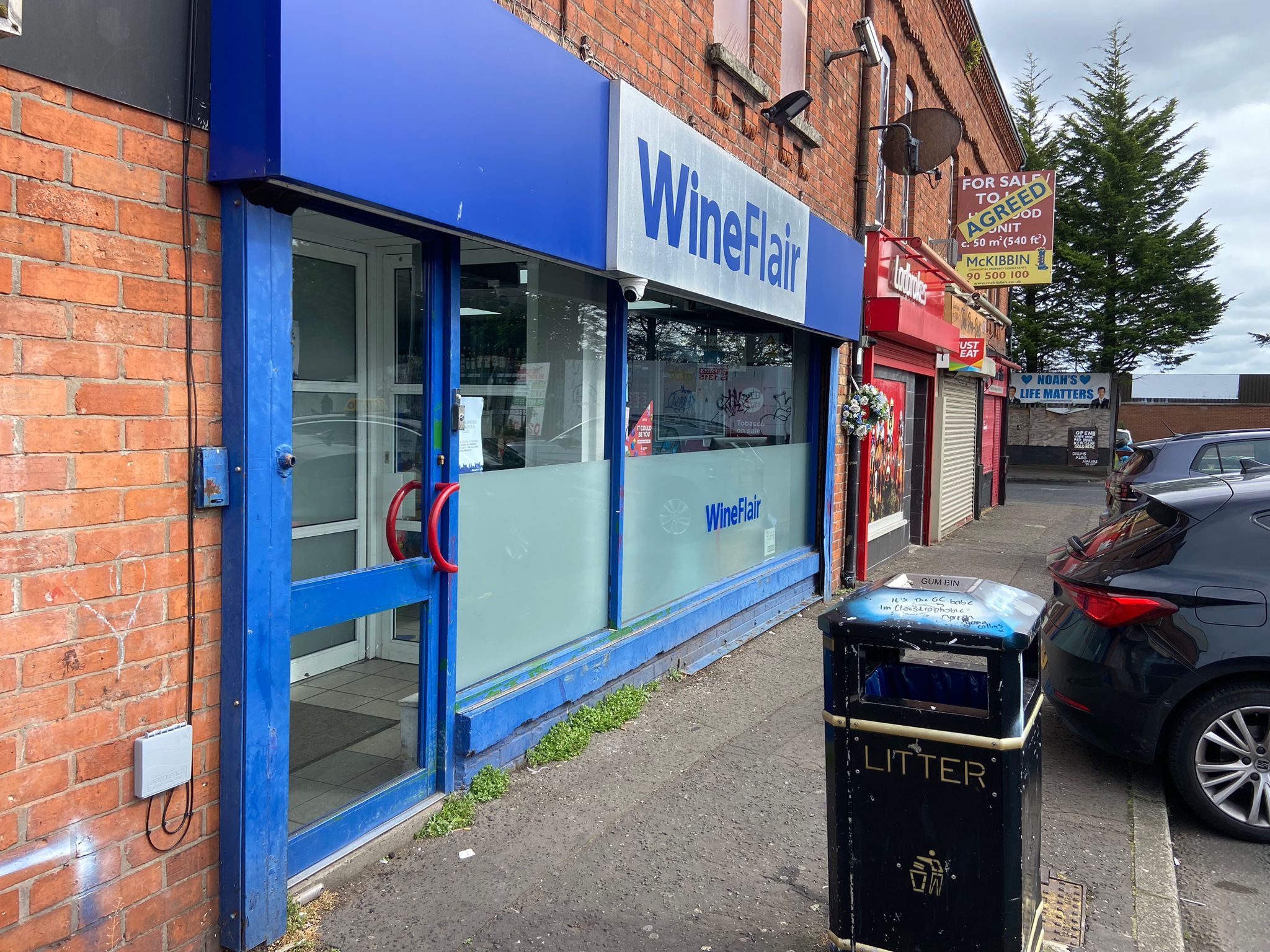 ROBBERY: Three men, one with a suspected firearm robbed the Wineflair on Oldpark Road