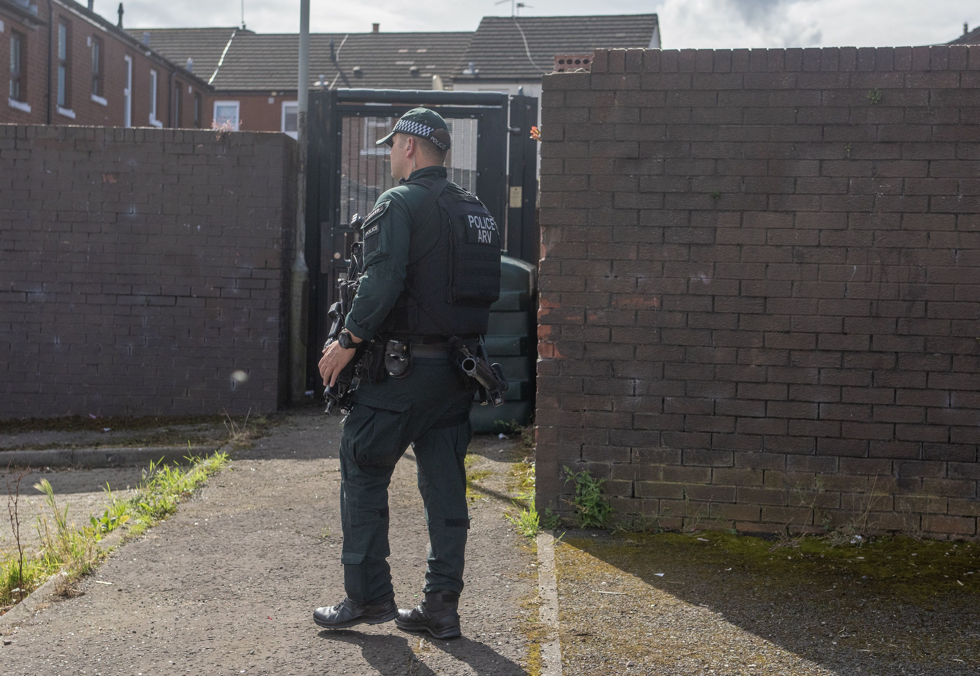 ARREST: Heavily armed police arrest a suspect at a property on Rosapenna Walk off Oldpark Road