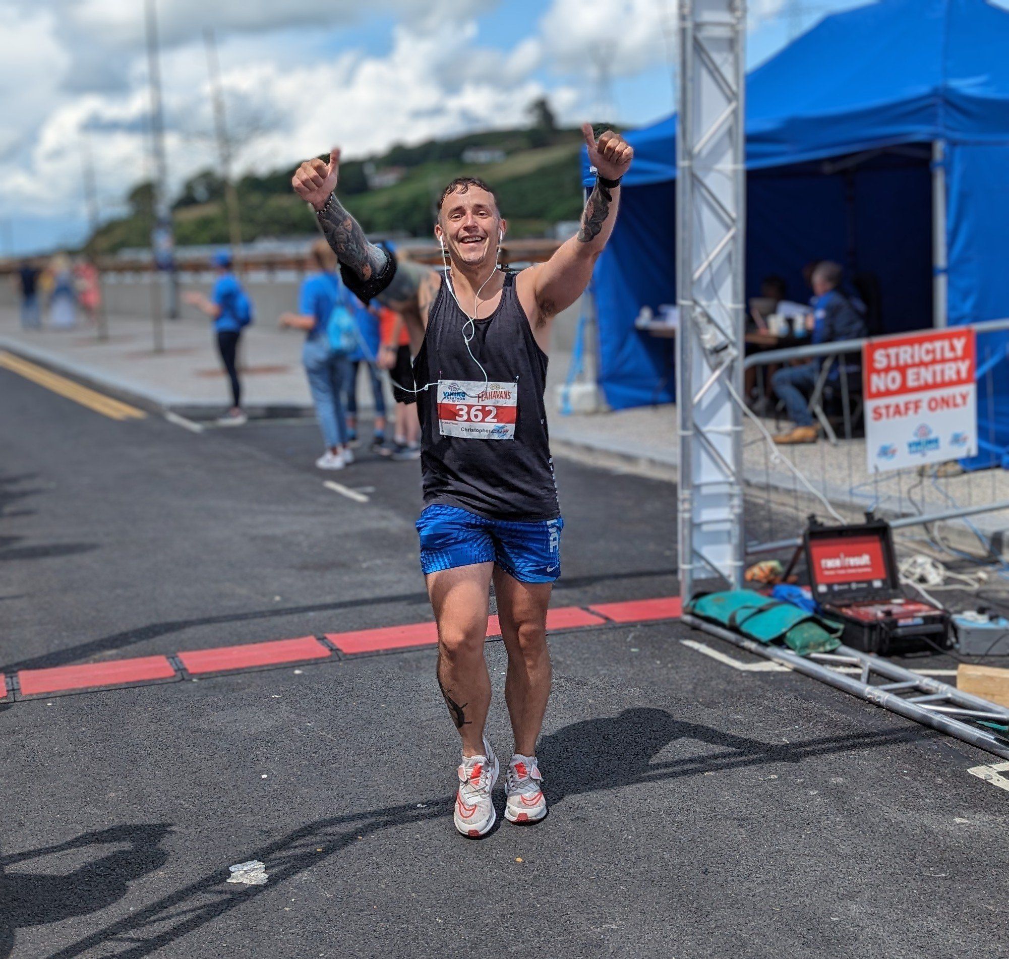 ULTIMATE CHALLENGE: Chris Wilkinson crosses the line after his fourth marathon