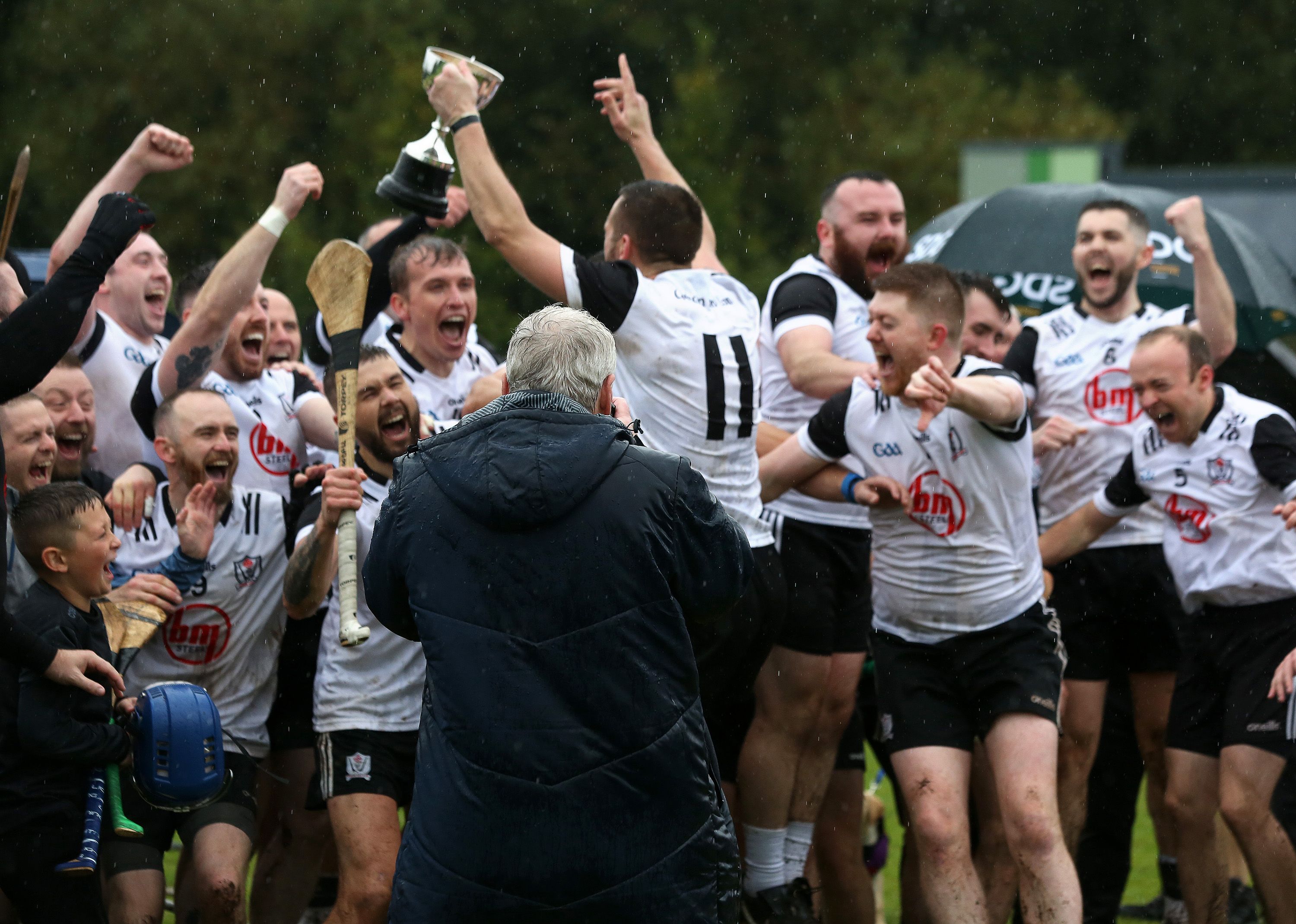 Ardoyne celebrate at the final whistle on Saturday