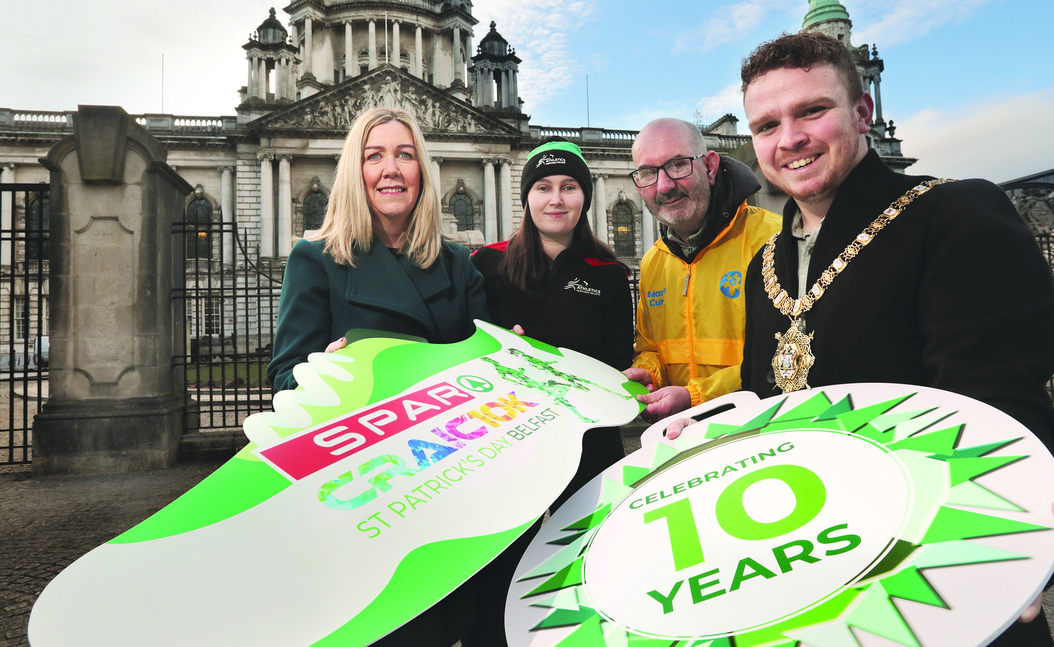 Pictured at Belfast City Hall for the launch of the 2024 SPAR Craic 10k are (L-R): Bronagh Luke, Henderson Group; Kristen Haire, Athletics NI; Conor O’Kane, Marie Curie; Lord Mayor, Cllr Ryan Murphy 