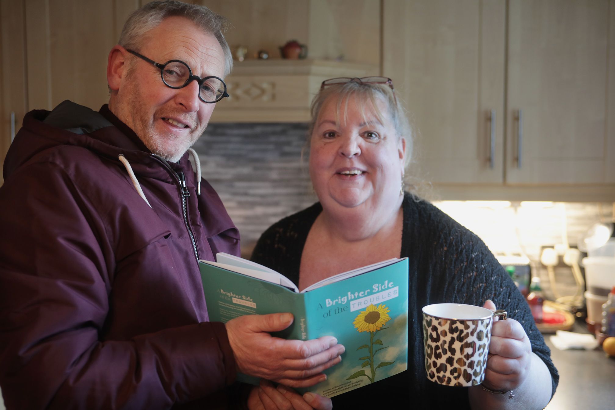 A DIFFERENT VIEW: Alan McBride and Ann Marie Loughran with the new book, \'A Brighter Side of The Troubles\'