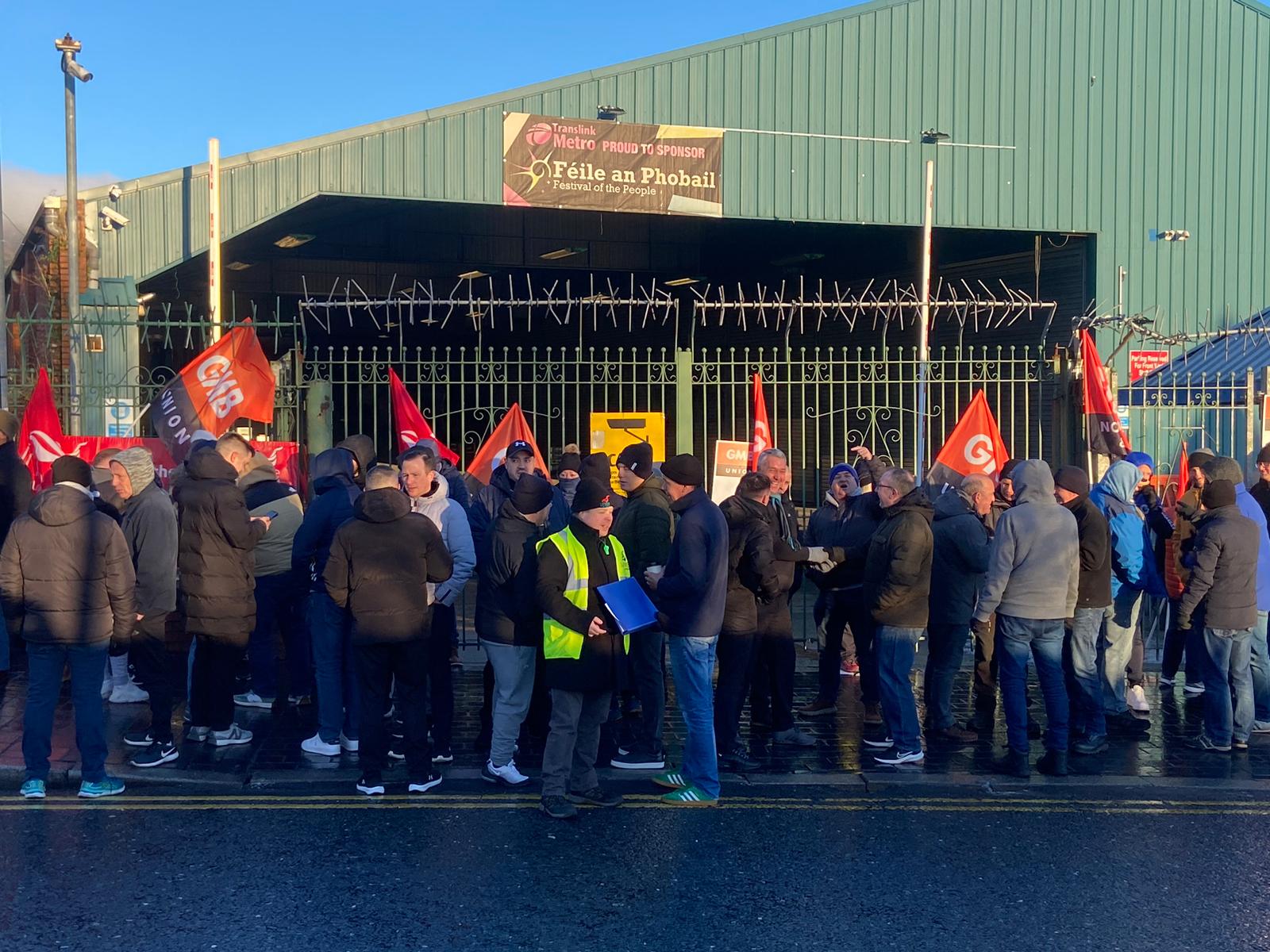 OUT: Transport workers on strike outside Falls Road Bus Depot on 18 January