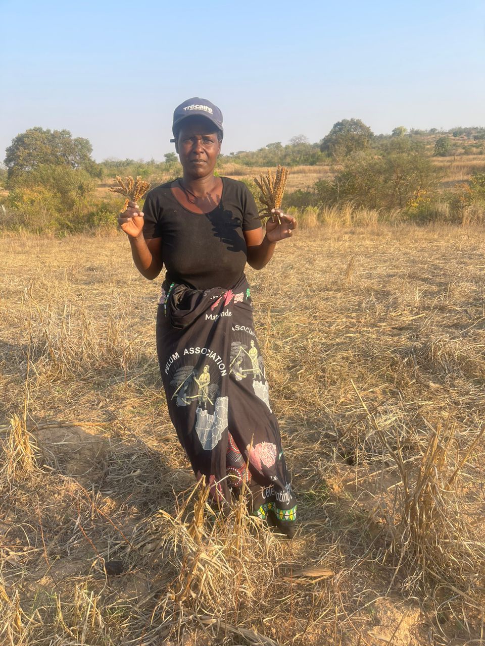 Kerita in a field where she harvested finger millet