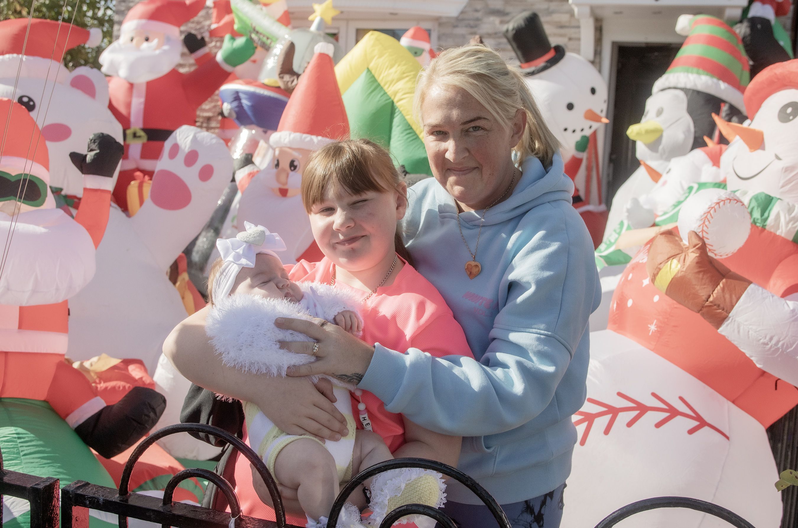 FESTIVE SPIRIT: Sammy Jo with children Casey and Heidi Mila