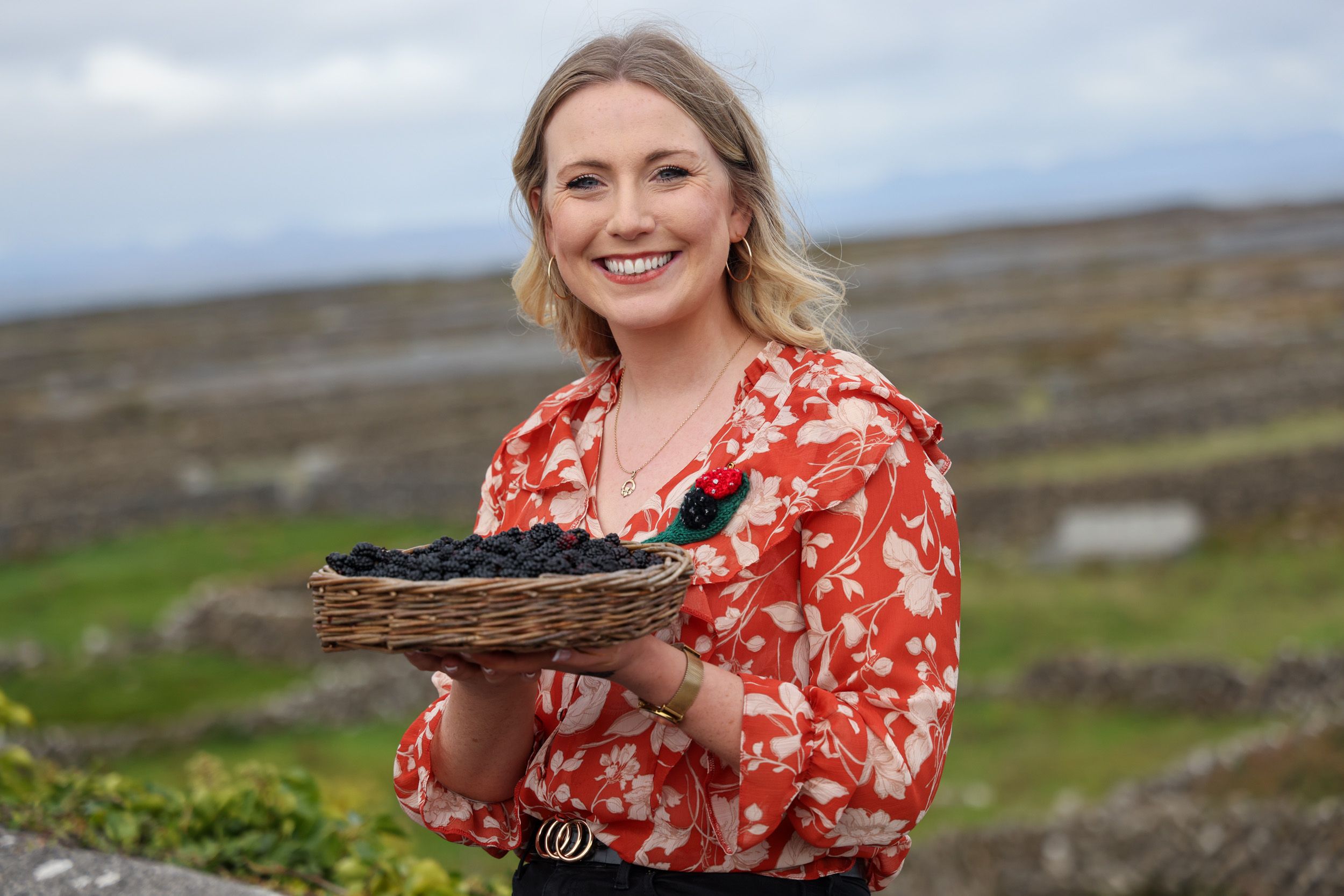 HARVEST FRUIT: Aedín Ní Thiarnaigh fills a basket during Féile na bPuiteachaí