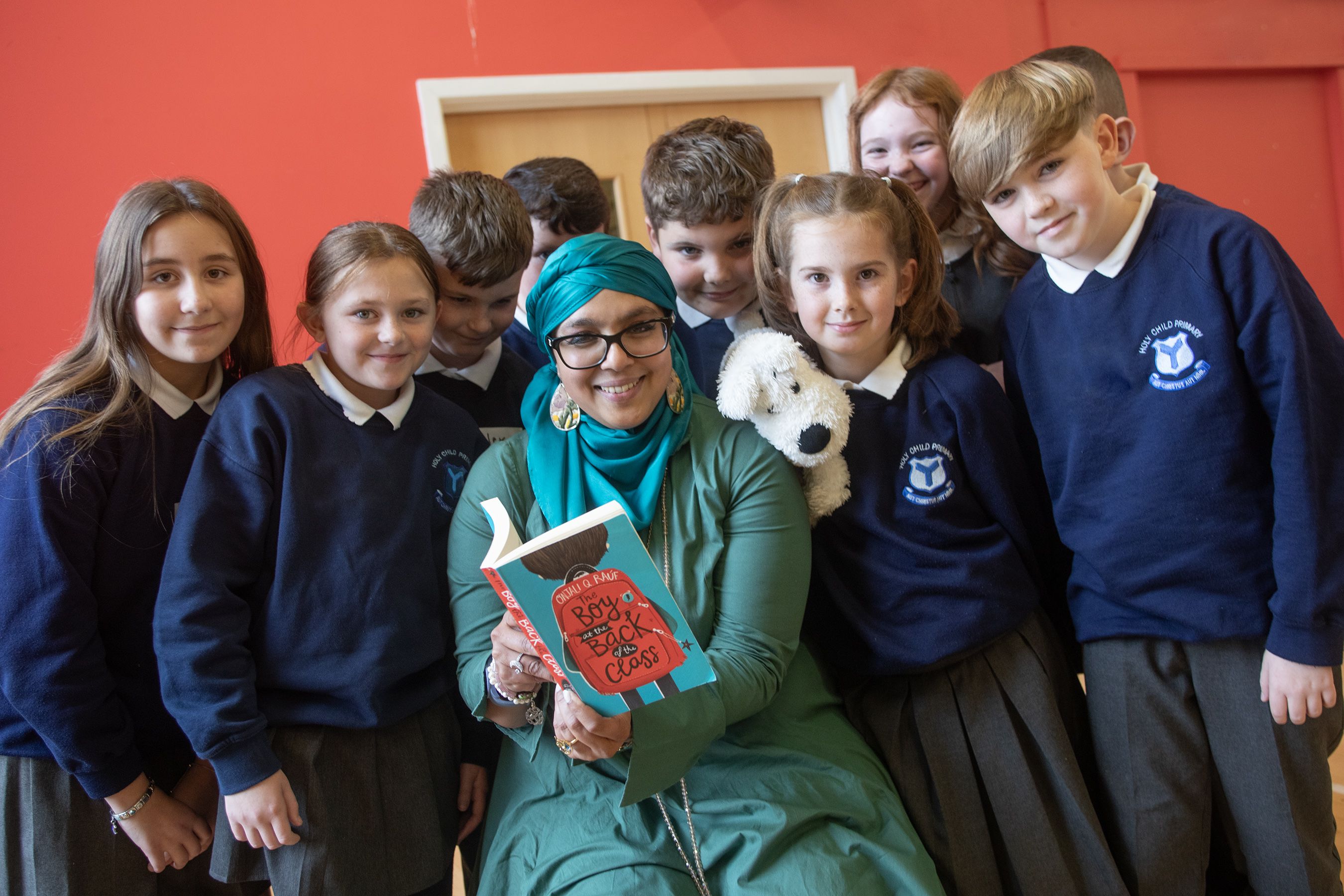 MEET THE AUTHOR: Onjali Q Rauf with children at Holy Child Primary School 