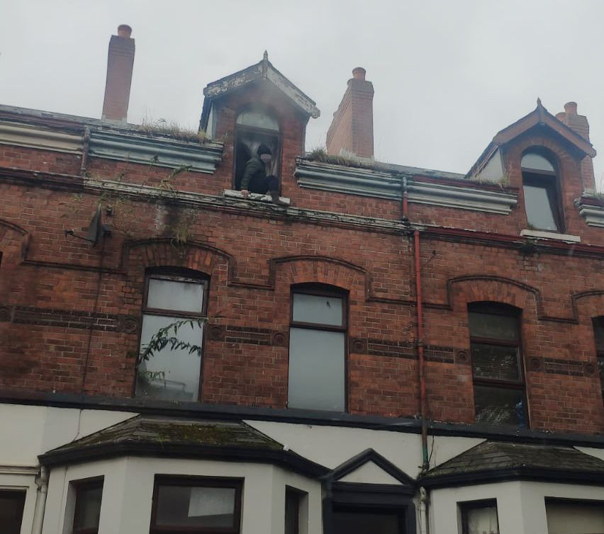 RESCUE: The man was trapped on the top floor of the house this morning