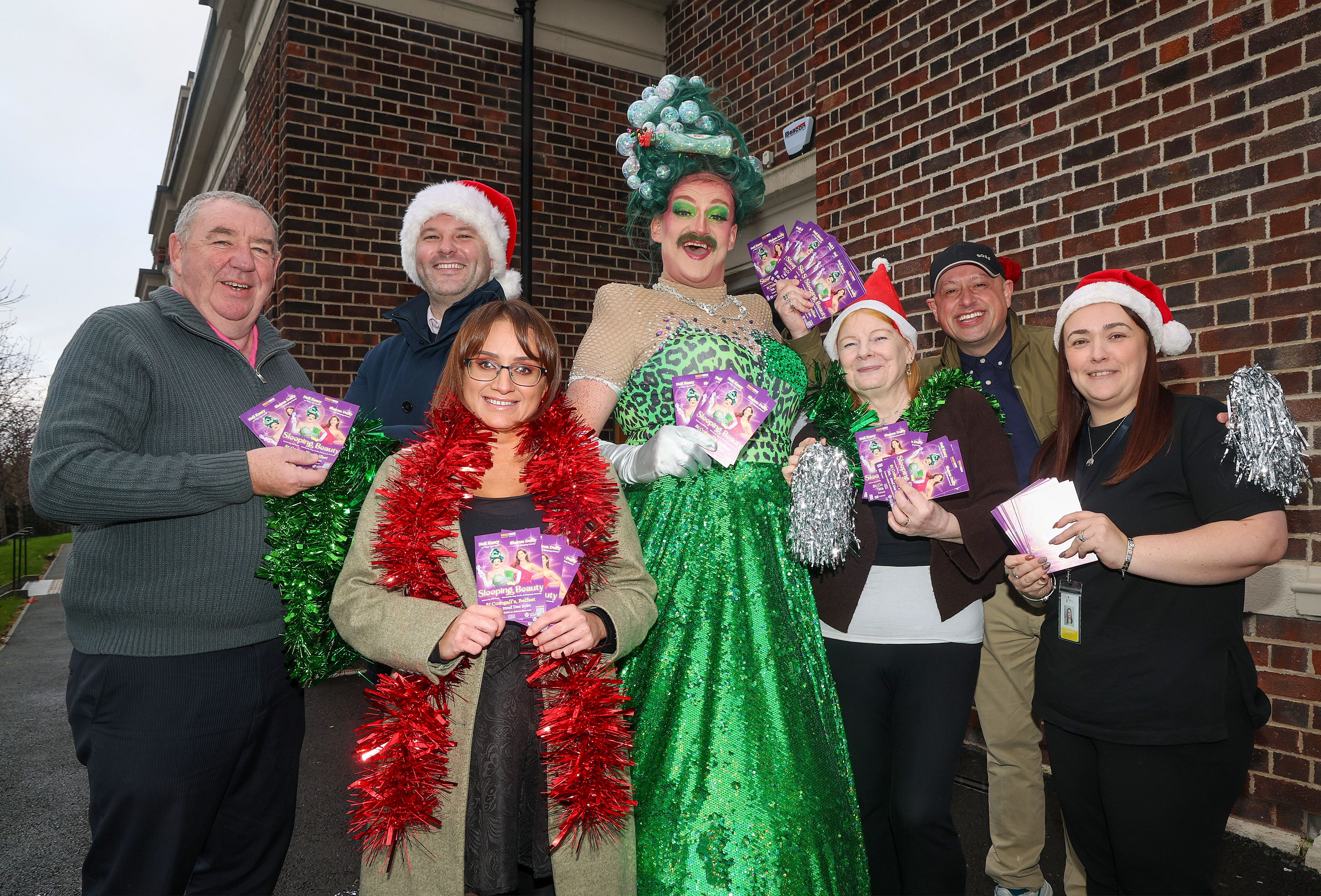 OH YES IT IS: Brassneck Theatre Company are joined by Clonard Credit Union and St Comgall’s staff at this week’s launch