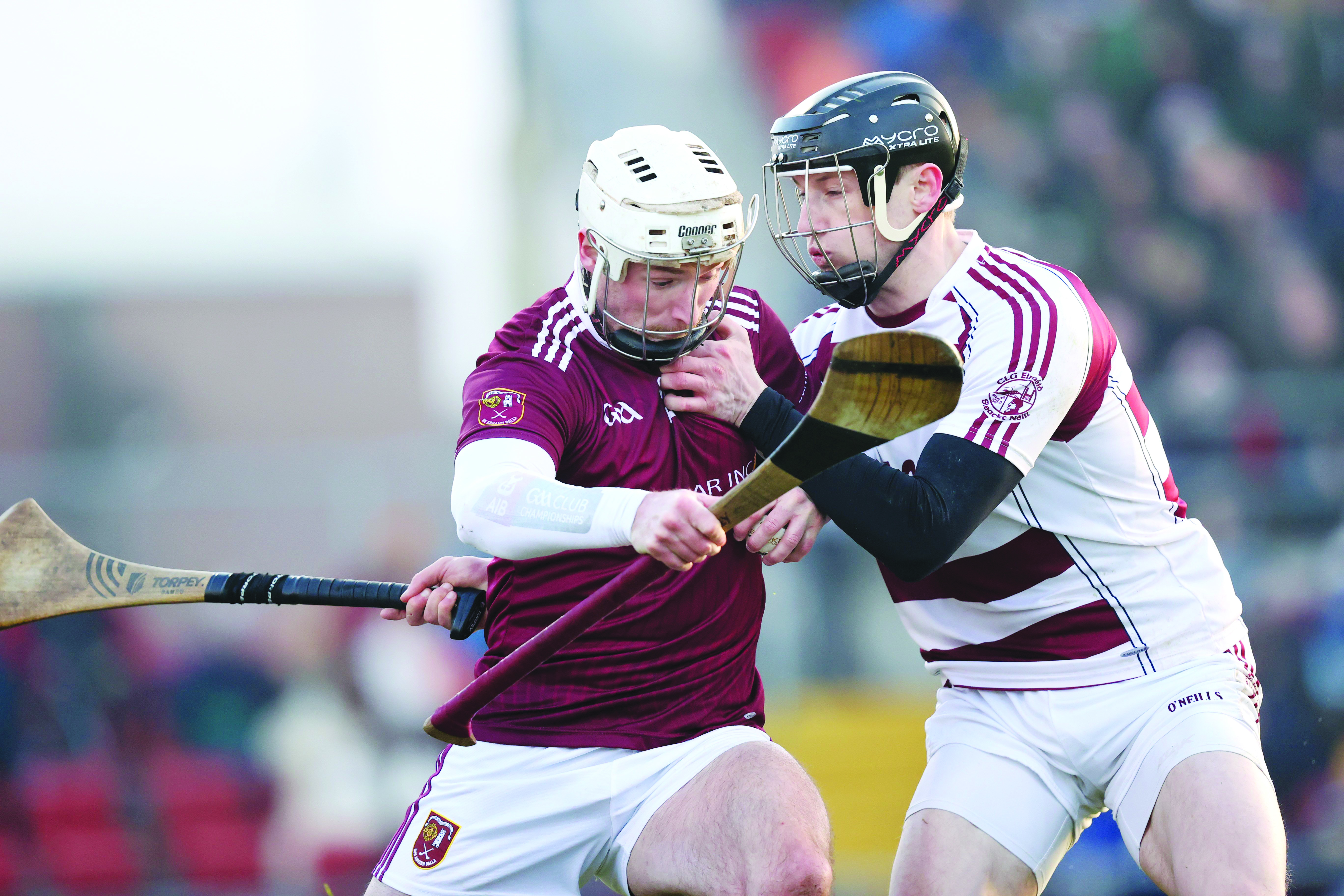 Paddy Burke is challenged by Brendan Rogers during Cushendall’s win over the Derry side in last year’s Ulster final