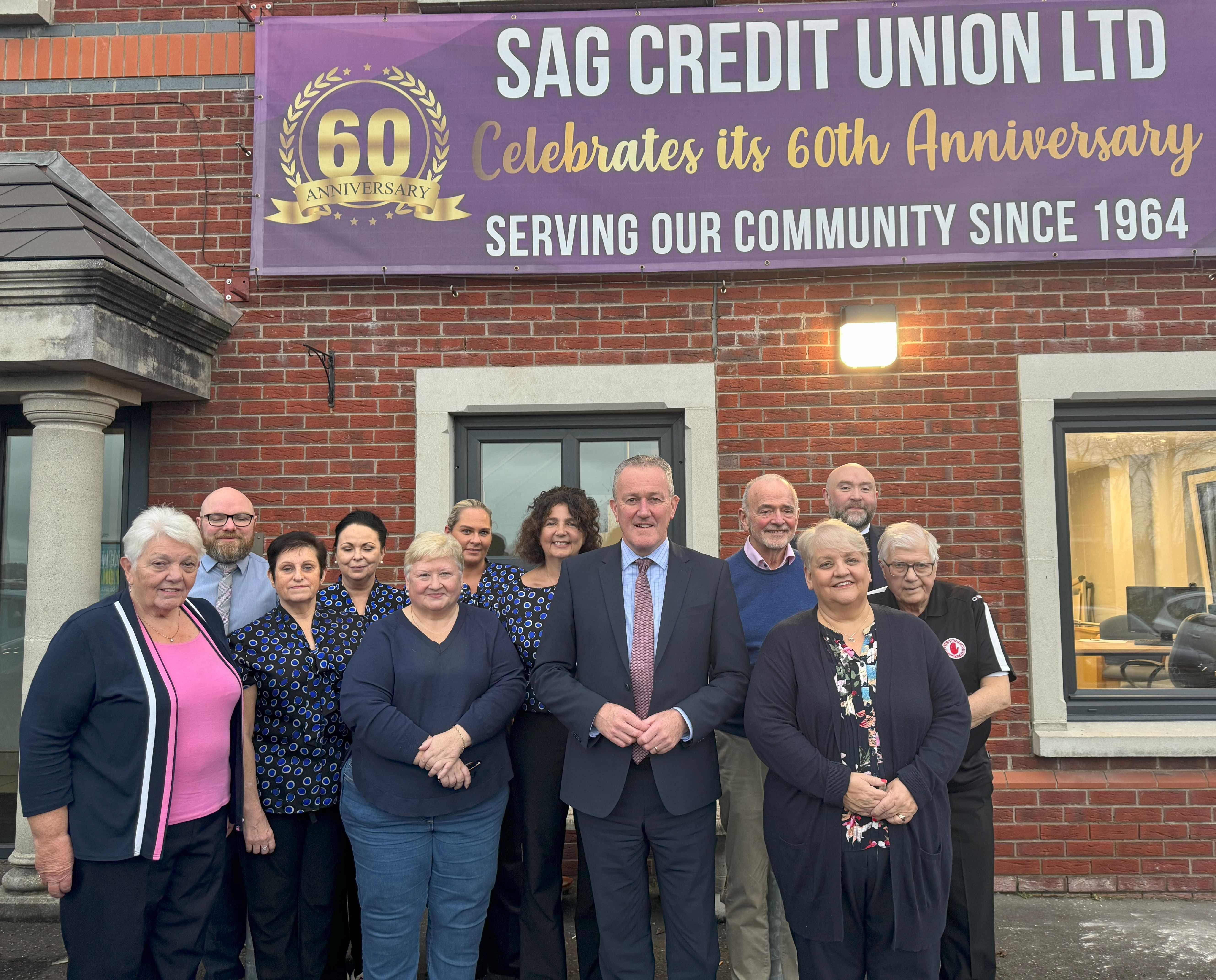 WELCOME: Economy Minister Conor Murphy visiting SAG Credit Union in Andersonstown