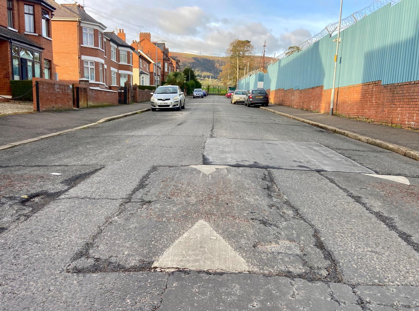 ISSUES: Damaged speed ramps and multiple potholes in Divis Drive