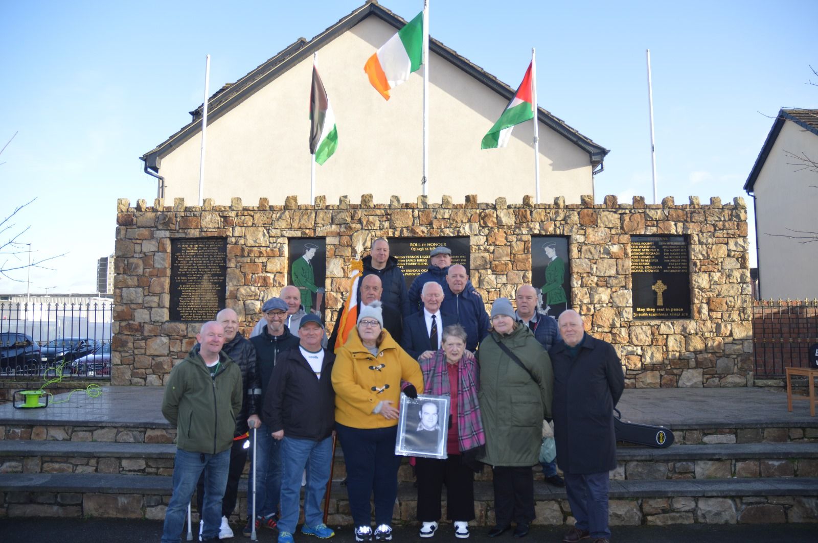 TOGETHER: Mary Brady and daughters Patricia and Frances, the extended Brady family, Danny Morrison, Gerry McCabe and members of the Brady/Liggett Sinn Féin Cumann