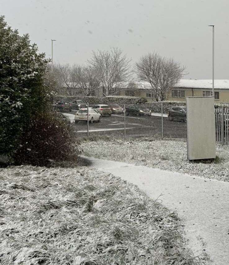 SNOW: Outside the Andersonstown News office on Thursday afternoon