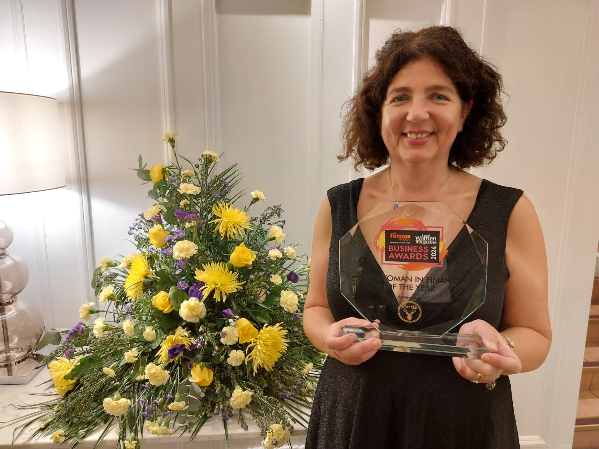 DESERVED: SAG Credit Union manager Sheena Joyce with the award she picked up at the Europa Hotel