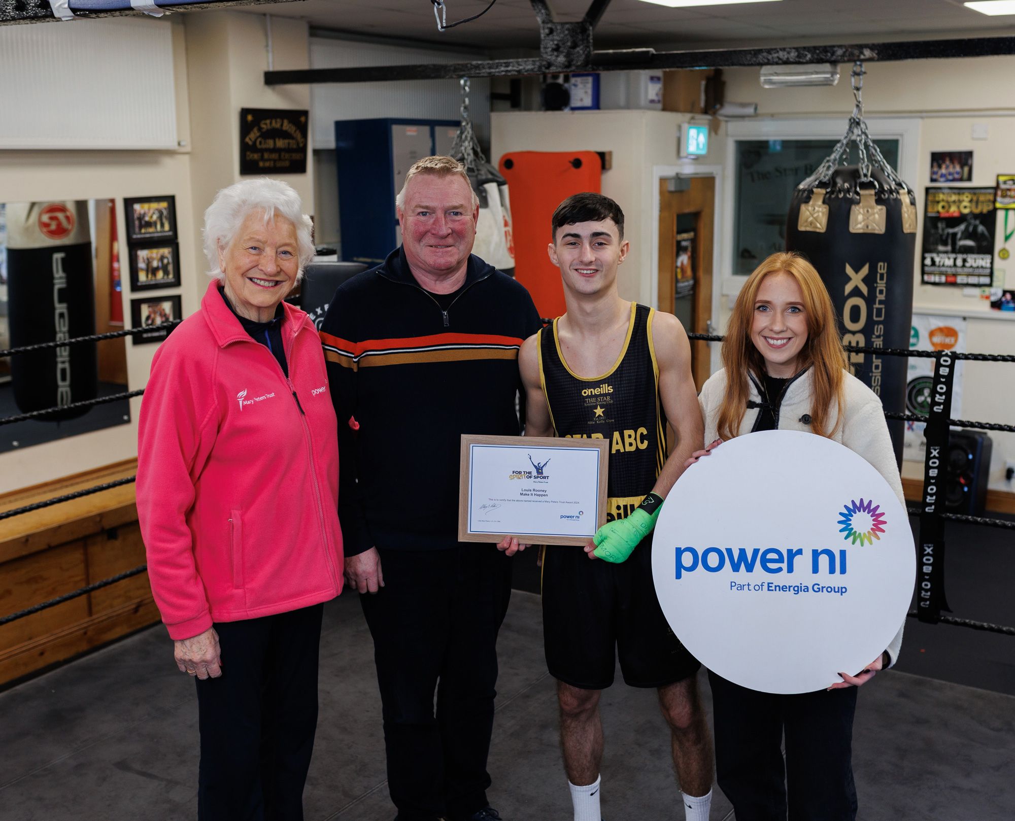 Pictured (L-R) is Olympic pentathlon gold medal winner Lady Mary Peters, Jim Gracey (Chair of the Mary Peter’s Trust), Make it Happen award recipient Louis Rooney, and Power NI’s Colleen Rainey.