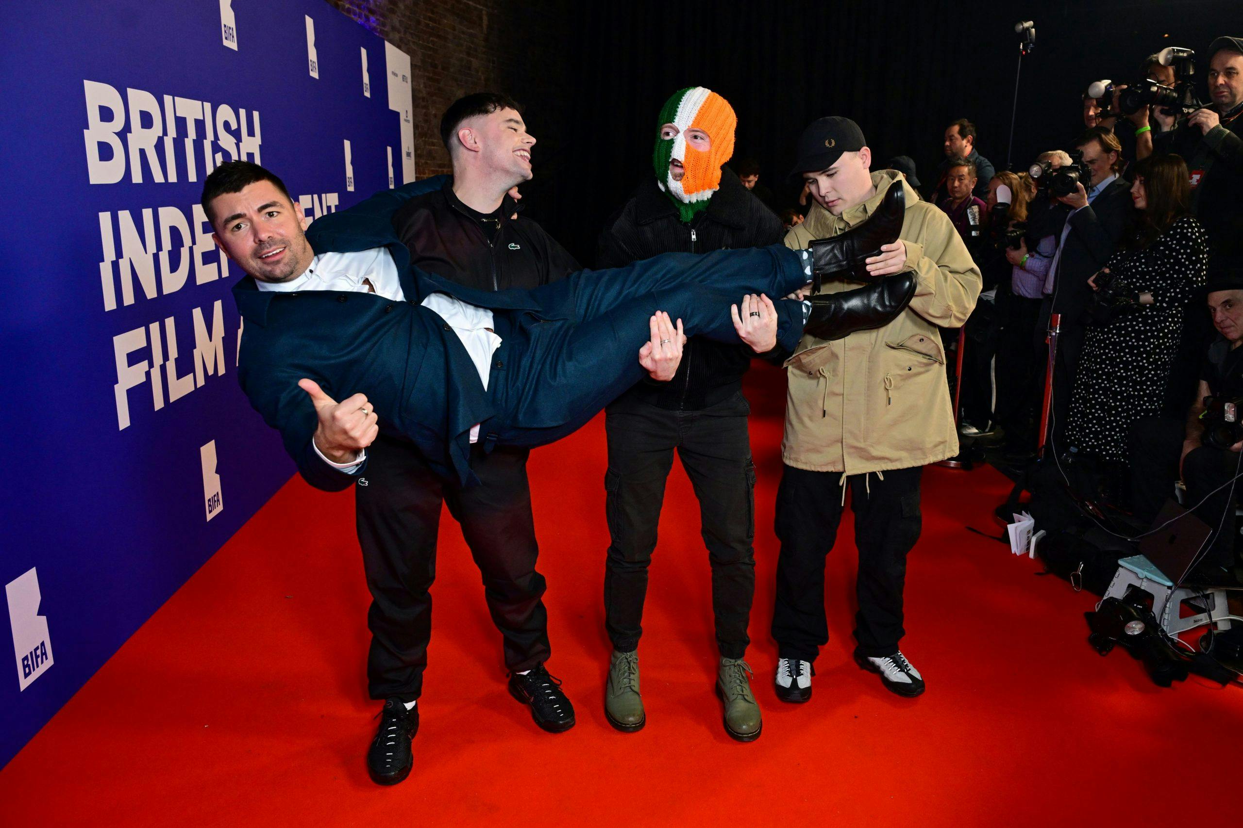 SEVEN TITLES: Director Rich Peppiatt with Kneecap members JJ Ó Dochartaigh, Liam Óg Ó hAnnaidh and Naoise Ó Cairealláin last night