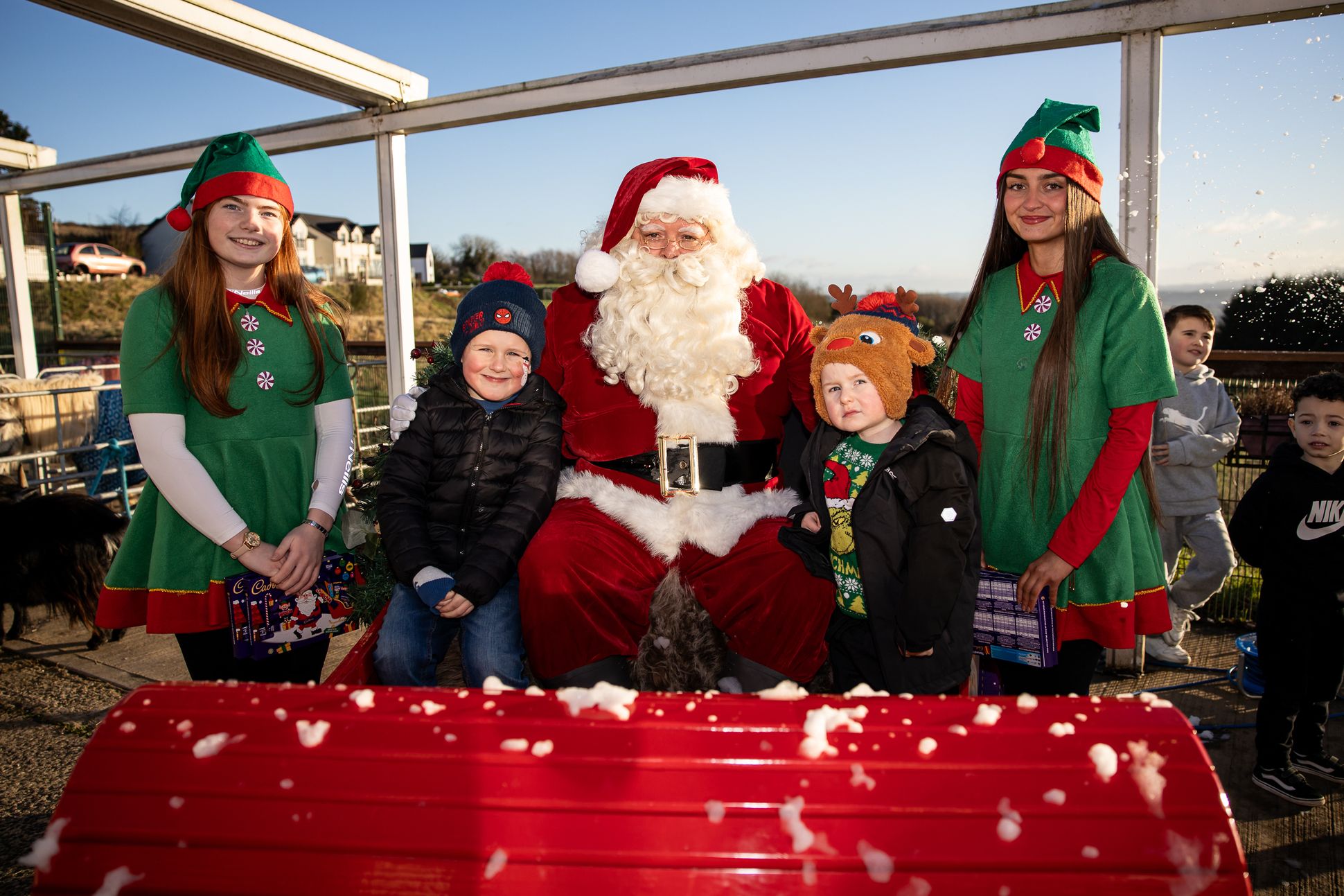 Kodi and Caleb Keep with Santa Claus and elves Liosa Stone and Cara Lynch