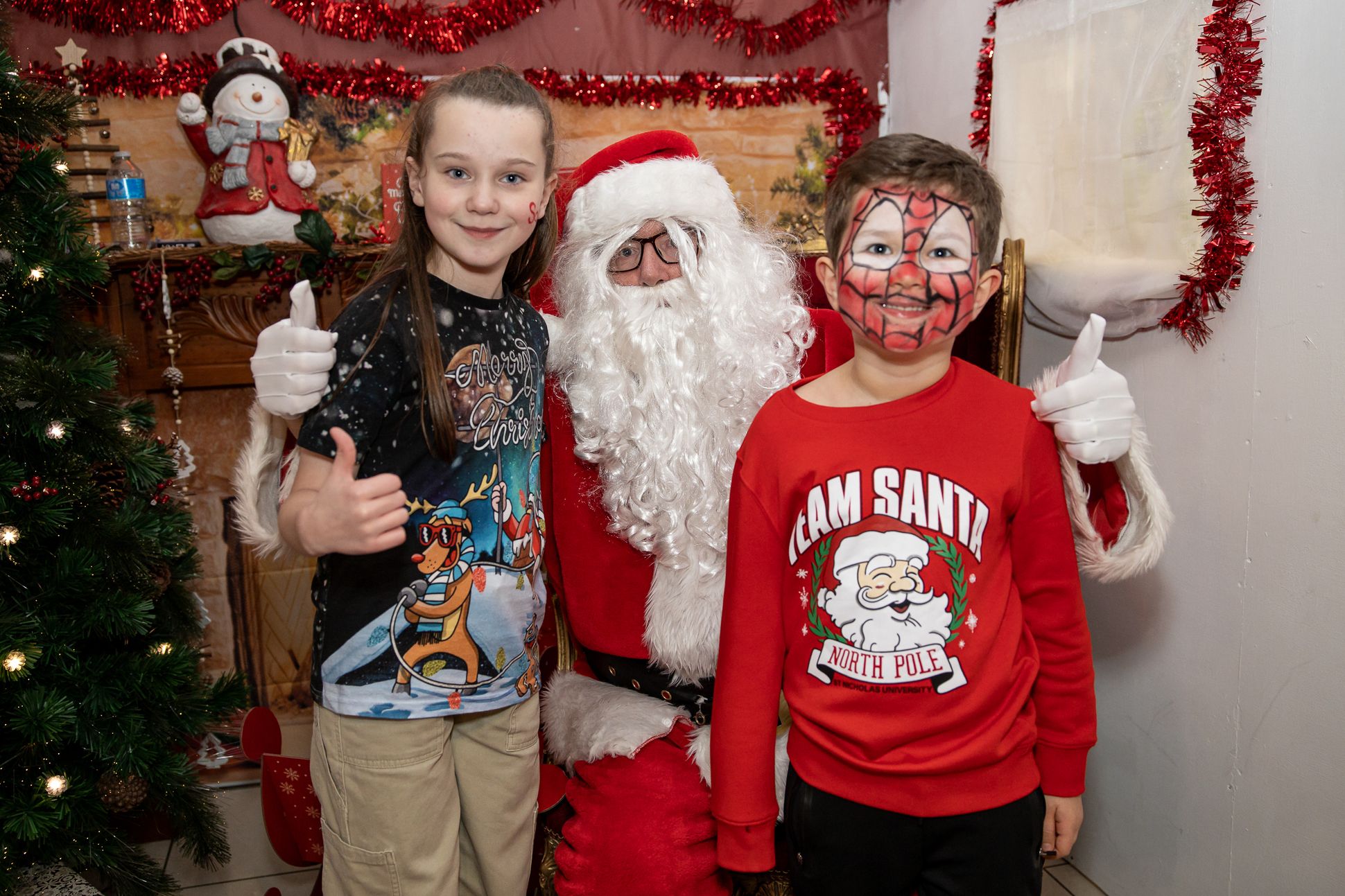 Thea and Mollie McKeever with Santa Claus