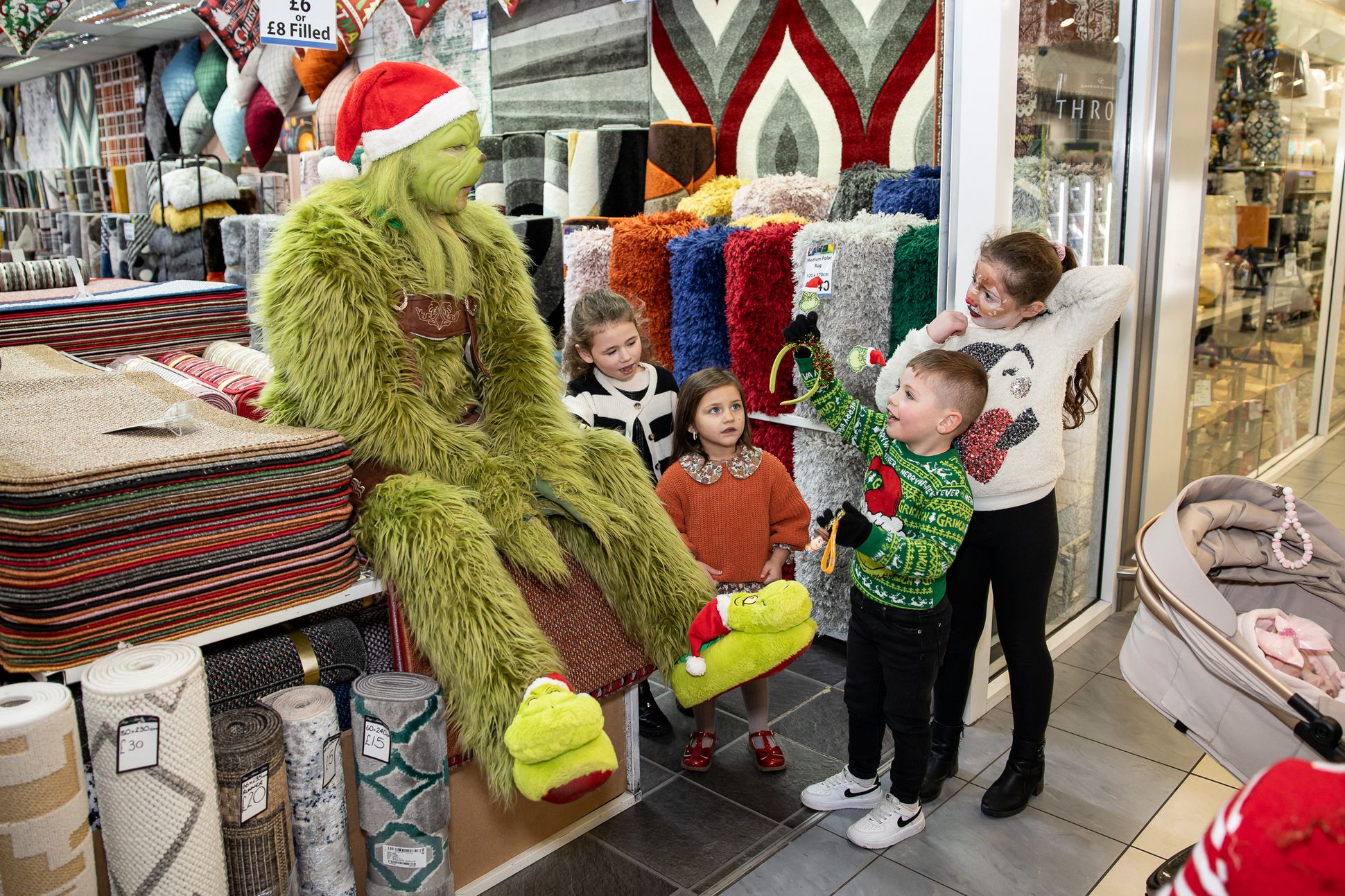 The Grinch greets children at the Park Centre