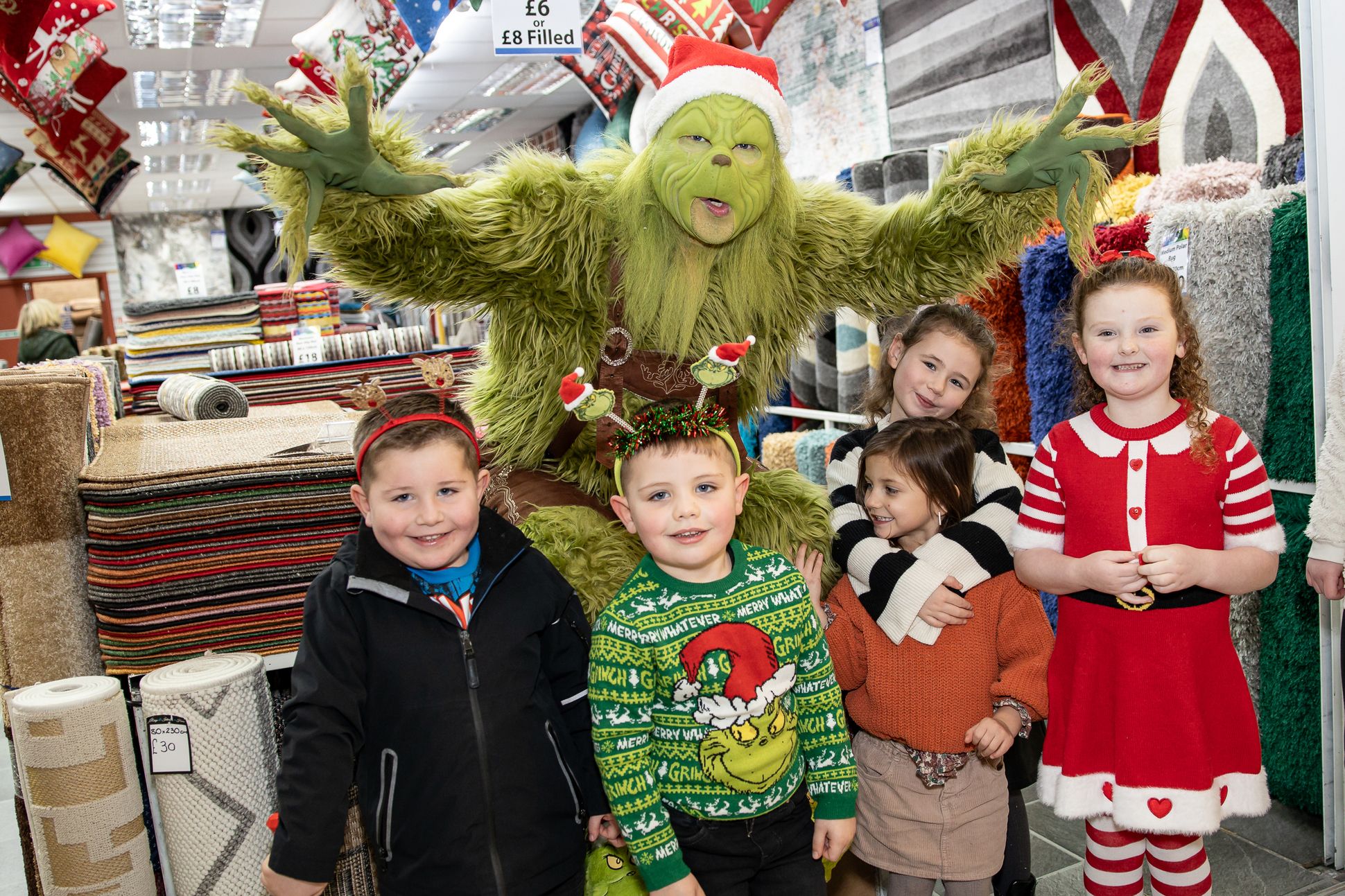 The Grinch greets children at the Park Centre