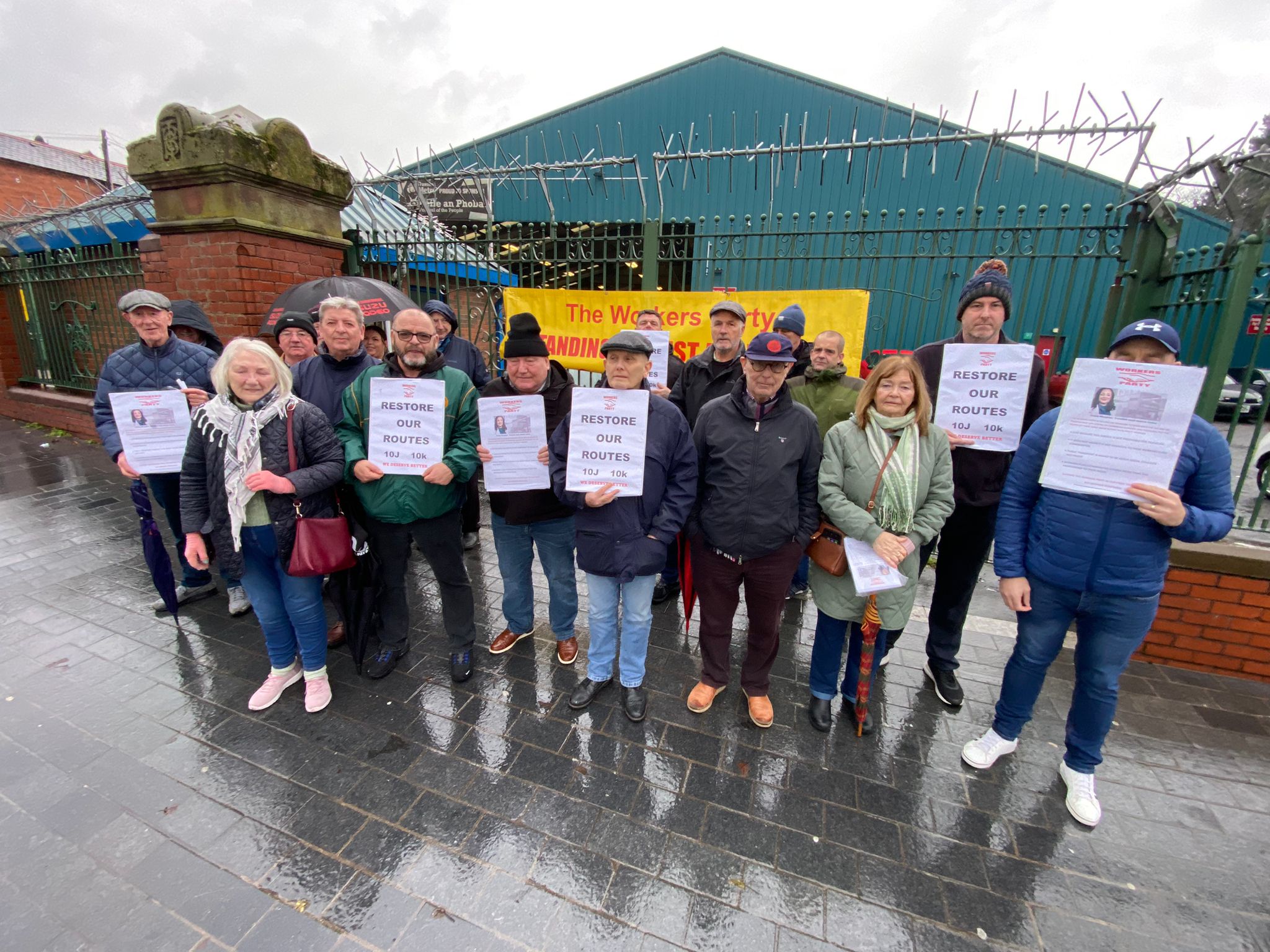 PROTEST: Workers\' Party reps outside Translink depot on the Falls Road 