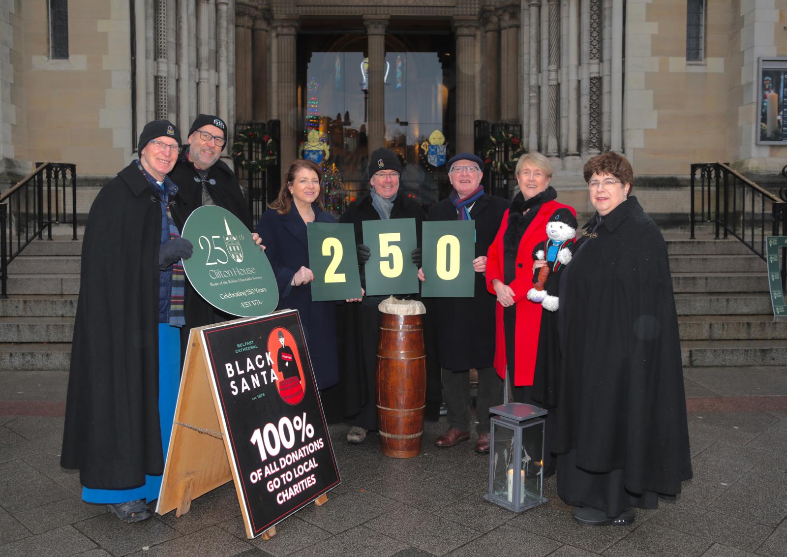 THE SPIRIT OF GIVING: Belfast Charitable Society representatives with Very Rev Stephen Forde at St Anne\'s Cathedral