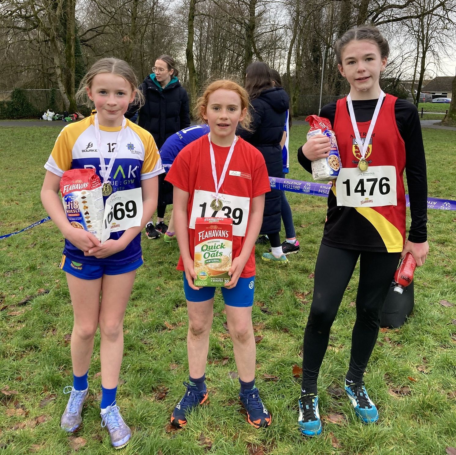Aoife Burke in second place, Eloise McAuley in first place and Evie Fawcett in third place in the first girls’ race