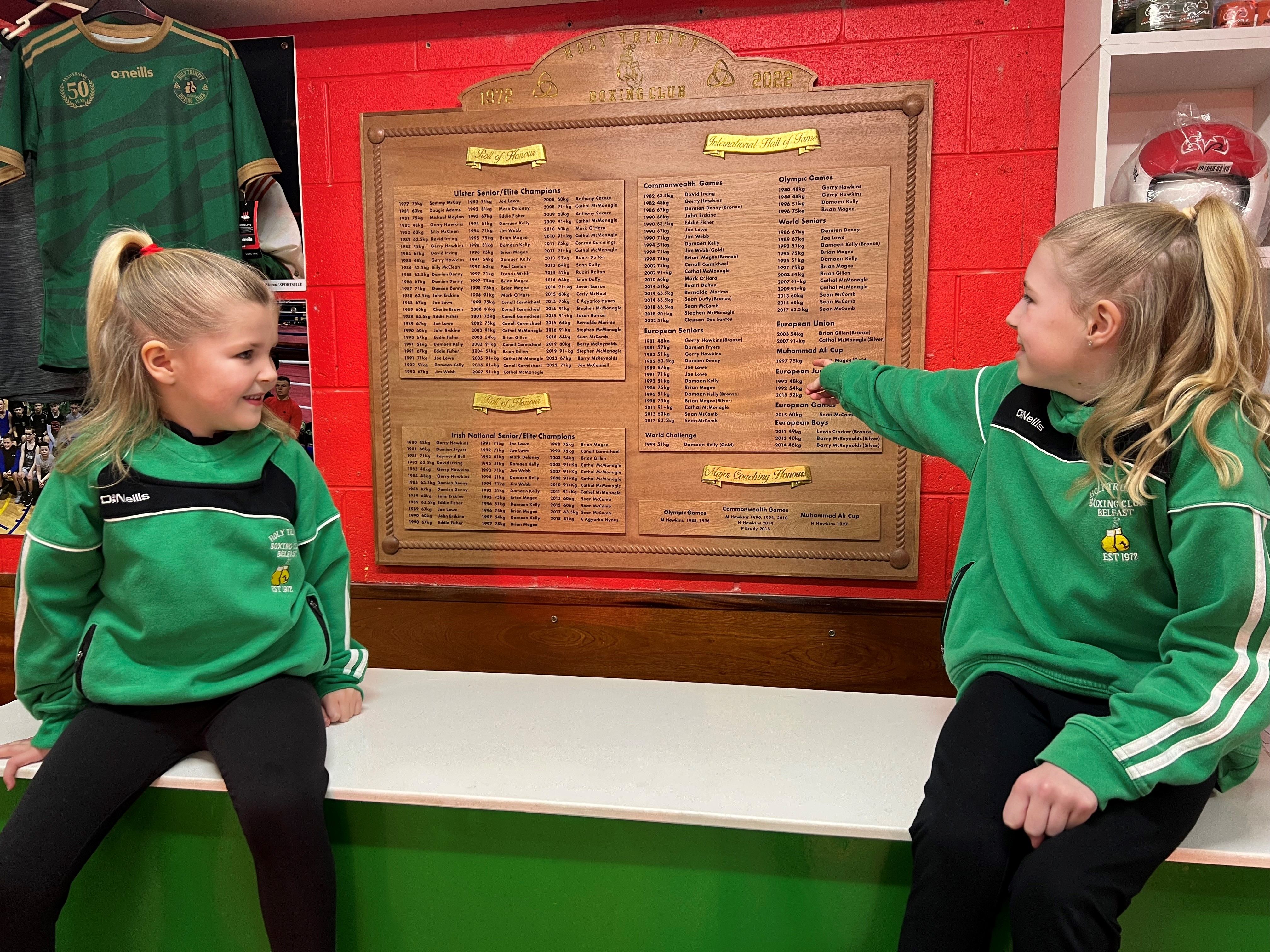 FUTURE\'S BRIGHT: Boxing sisters Madison and Mila Hawkins pictured at the unveiling of the Holy Trinity ABC Roll of Honour board spanning 50 years of one of the country\'s most successful boxing gyms based in Turf Lodge