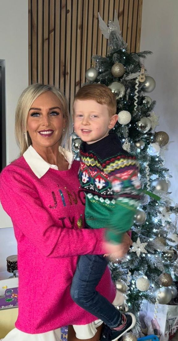 FRUSTRATION: Caroline Reilly with her son Luke. Luke still does not have a school place six months into the school year