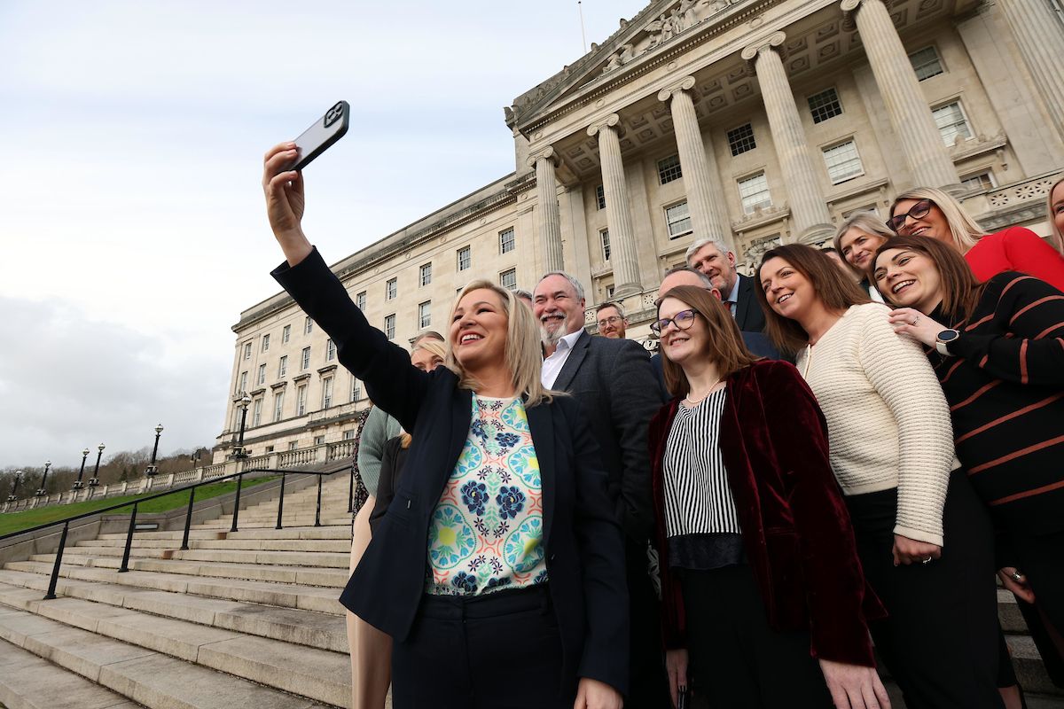 NEW START: First Minister Michelle O\'Neill takes a selfie at Stormont with MLA colleagues