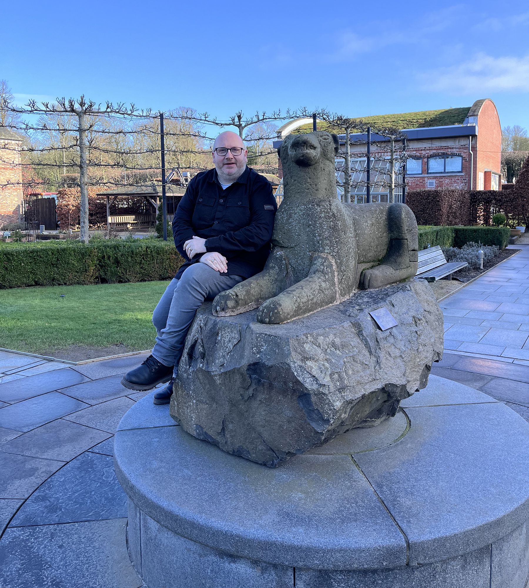 NEW TITLE: Author James Murphy beside the statue of the Massareene Hound in Antrim\'s Castle Gardens