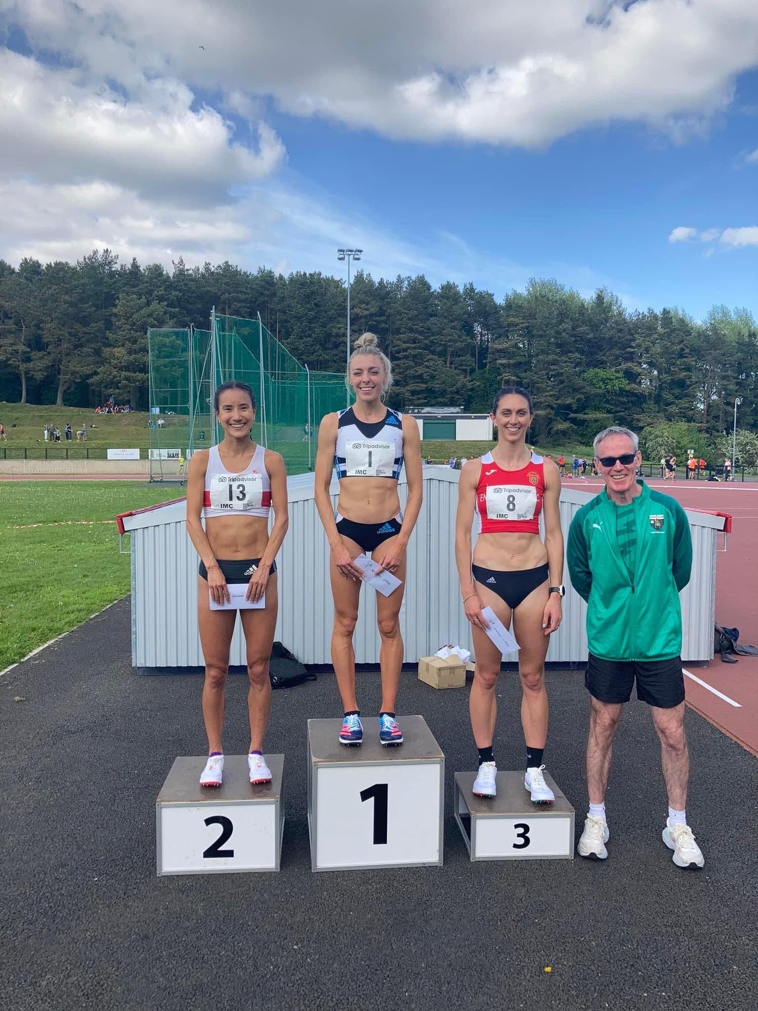 Cathal McLaughlin from Derry Track Club presenting podium prizes to the women’s international 1500m at the 2022 Belfast Irish Milers Meet in association with Tripadvisor. Olympian Alex Bell from Great Britain topped the podium