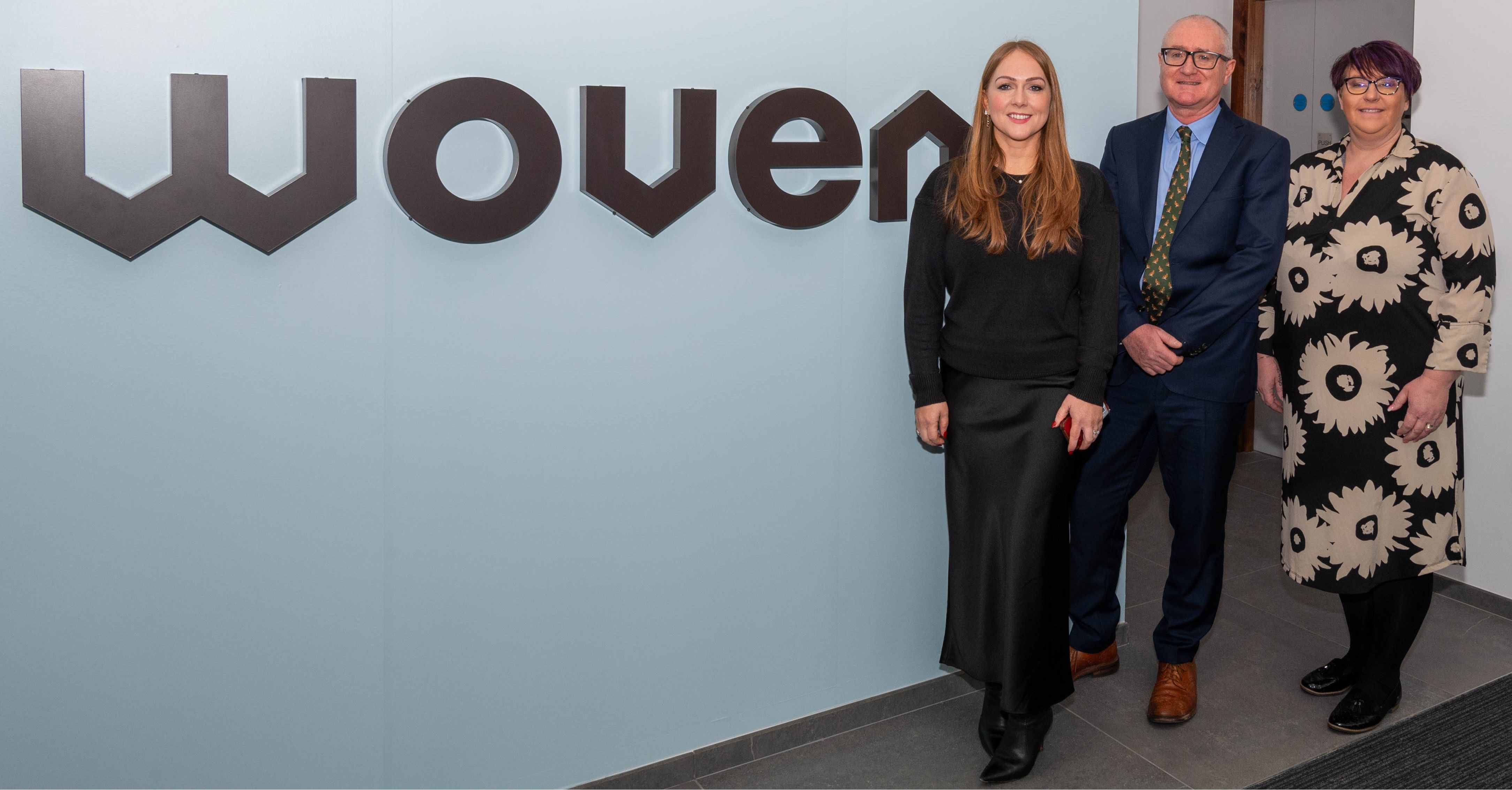 HOUSING INVESTMENT: Katrina Smyth (Director of Development), Neil McIvor (Chair) and Judith McNamee (Head of Housing) at Woven Housing Association