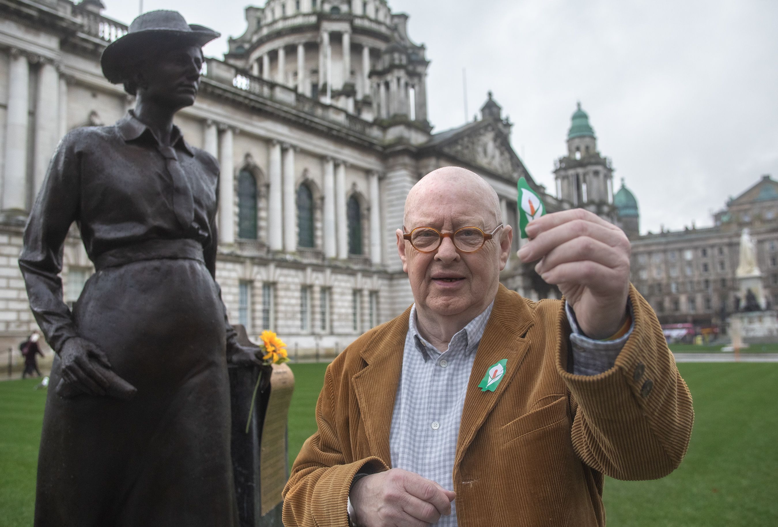 EASTER: Joe Austin with an Easter Lily in front of the newly unveiled statue to Republican, socialist and trade union activist Winifred Carney