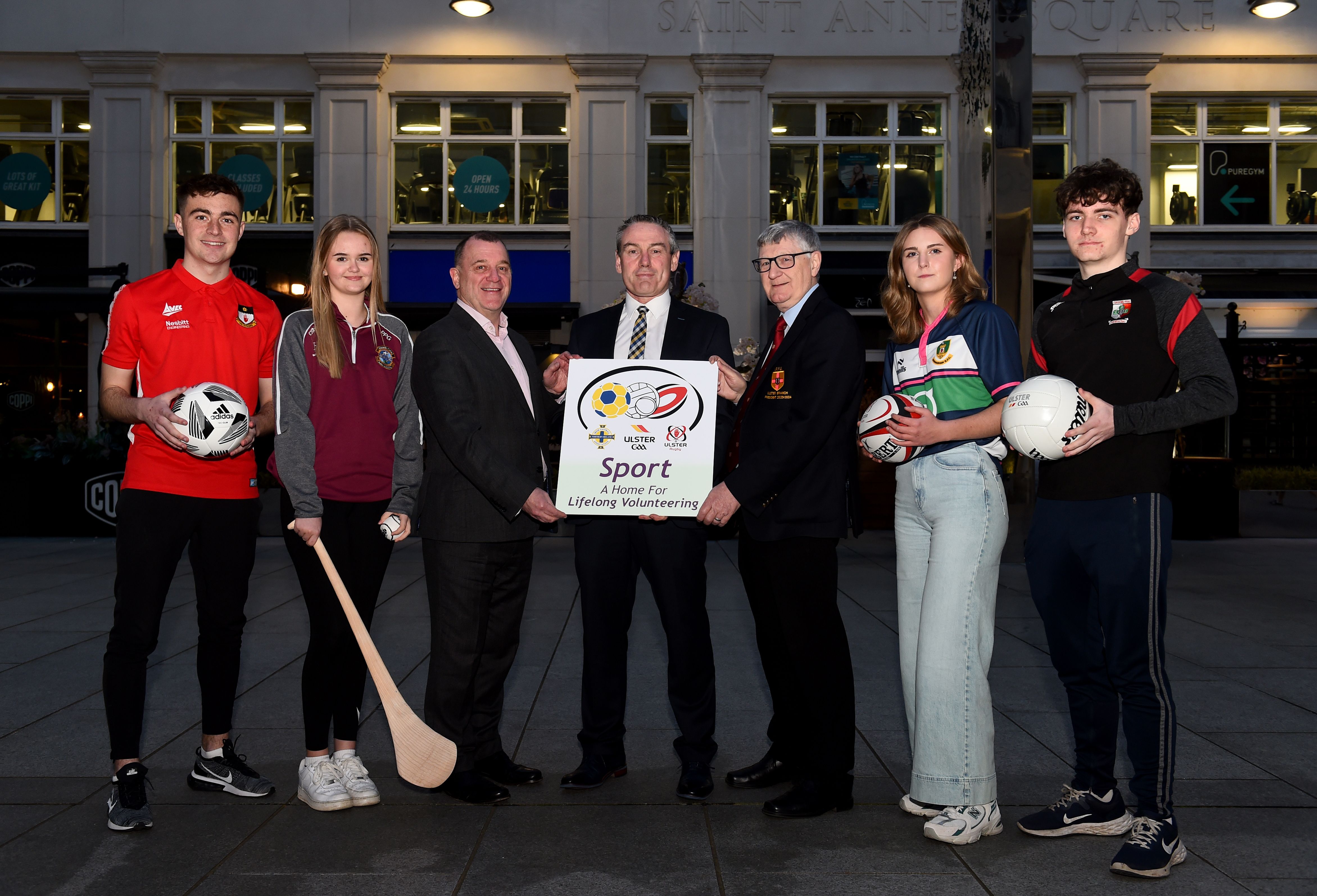 Young sports volunteers from Ulster GAA, Ulster Rugby and the Irish Football Association with Ciaran McLaughlin, Ulster GAA President, Patrick Nelson, Irish FA CEO, and Denis Gardiner, Ulster Rugby President