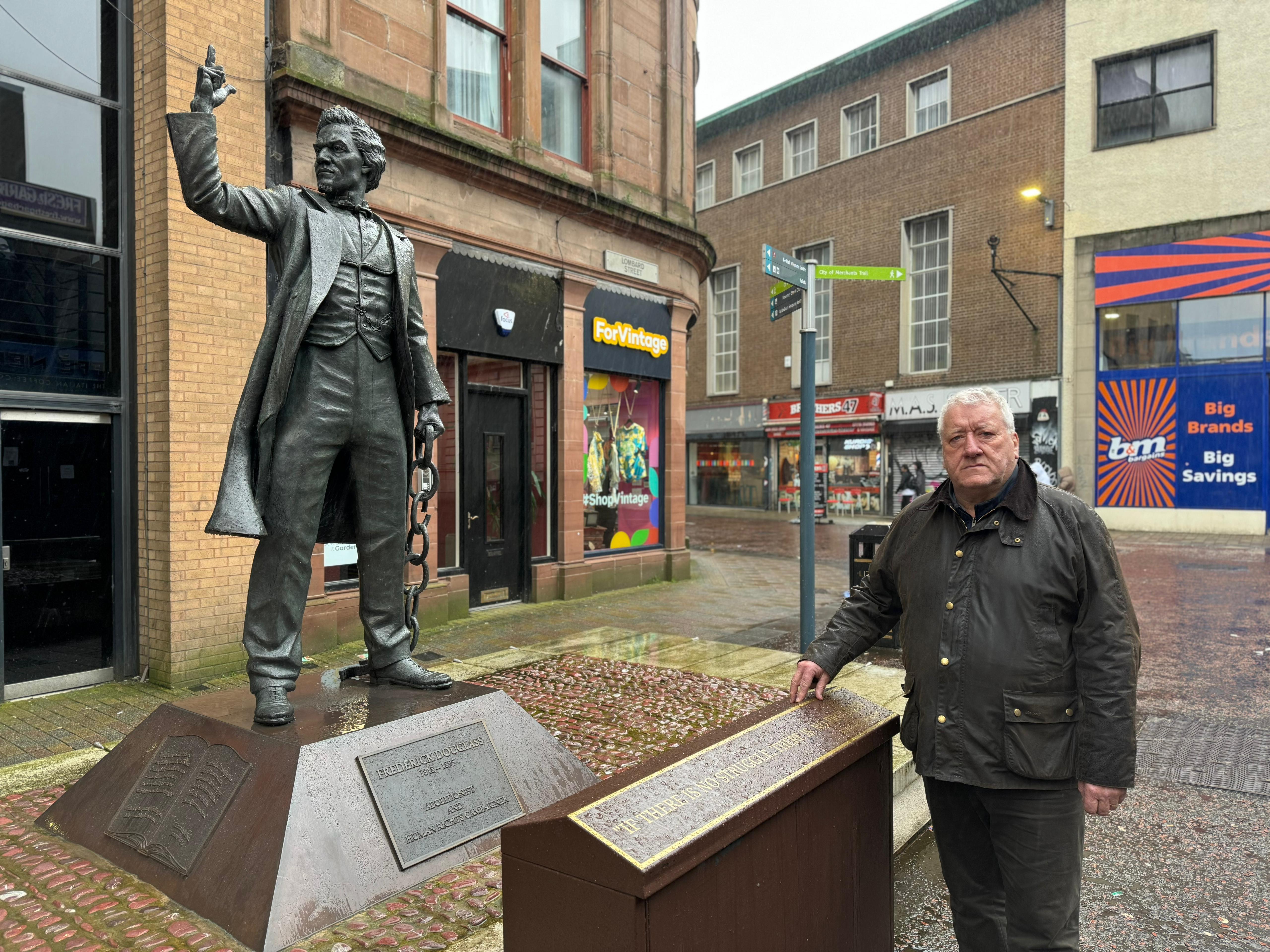 SUPPORT: SDLP Cllr Pat Catney at the Frederick Douglass statue in Belfast