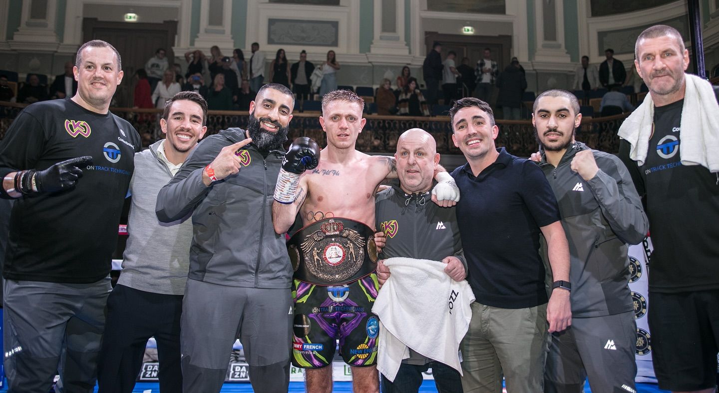 Kurt Walker and his team celebrate Saturday\'s win that saw him take the WBA Continental Europe featherweight title