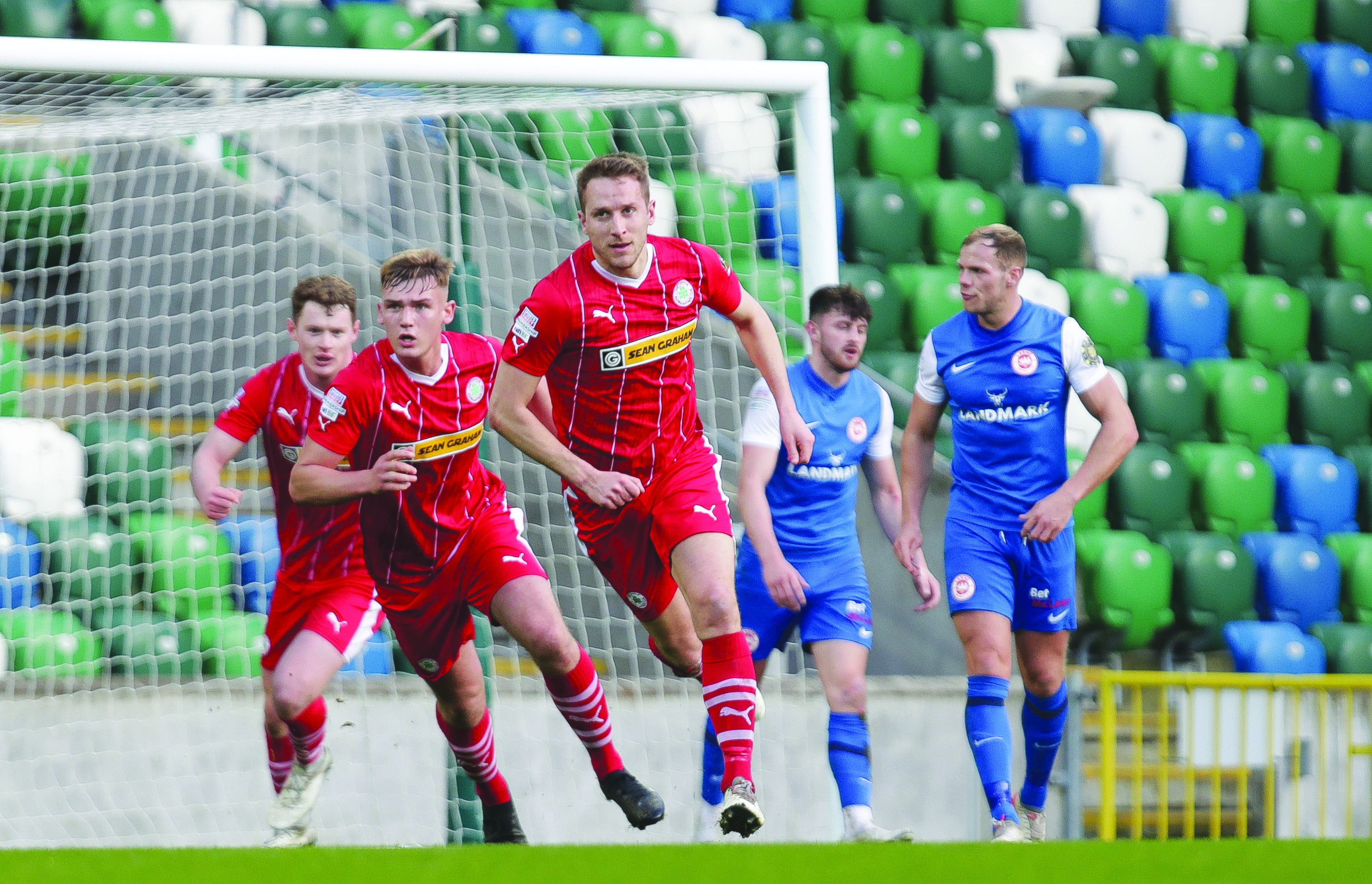 Jonny Addis wheels away after opening the scoring at Windsor Park on Saturday