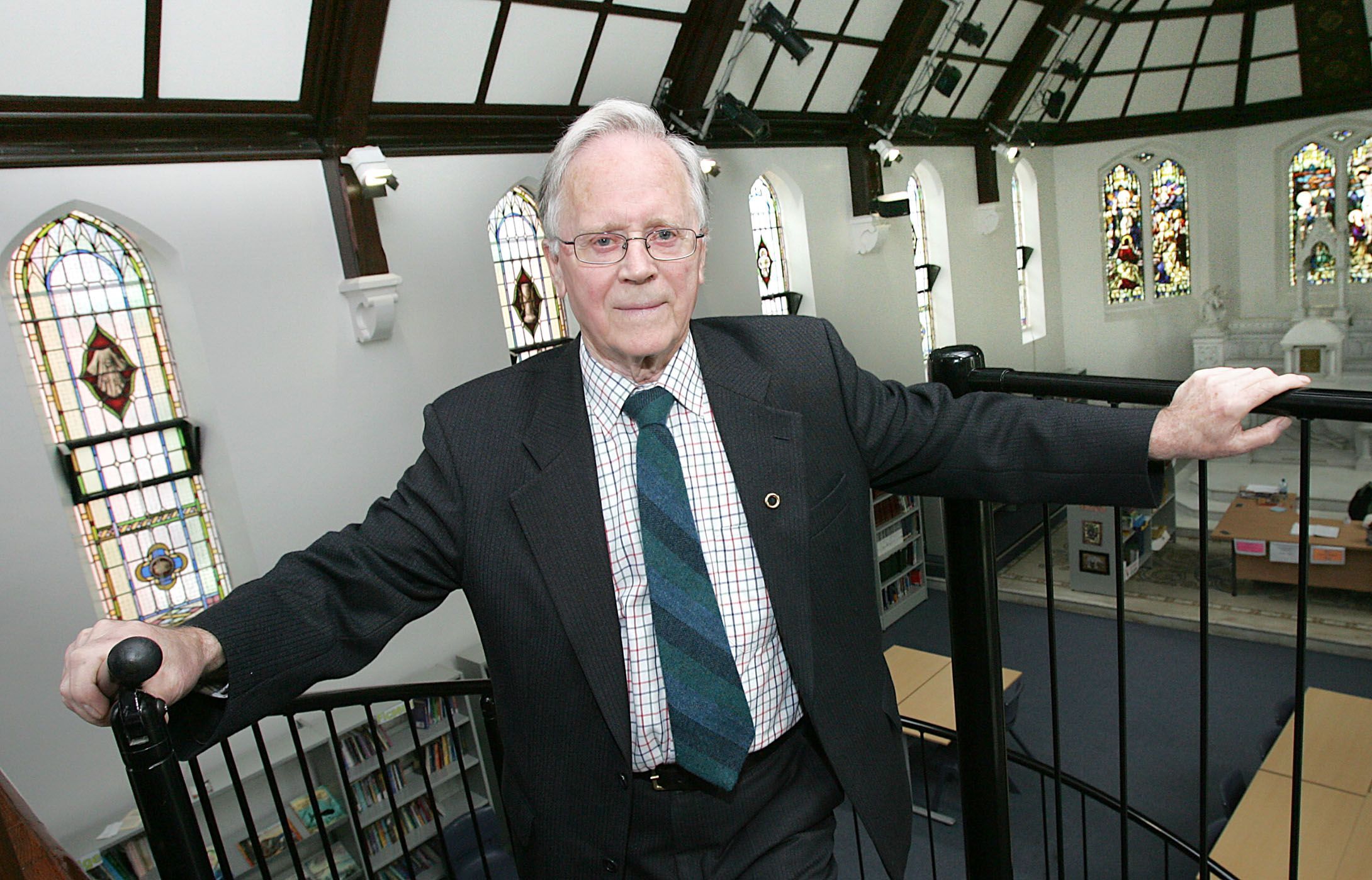 LAOCH AR LÁR: Seán Mackel pictured in the chapel at Coláiste Feirste - previously St Mary\'s old people\'s home - which he and son Ciarán refurbished as a library. 