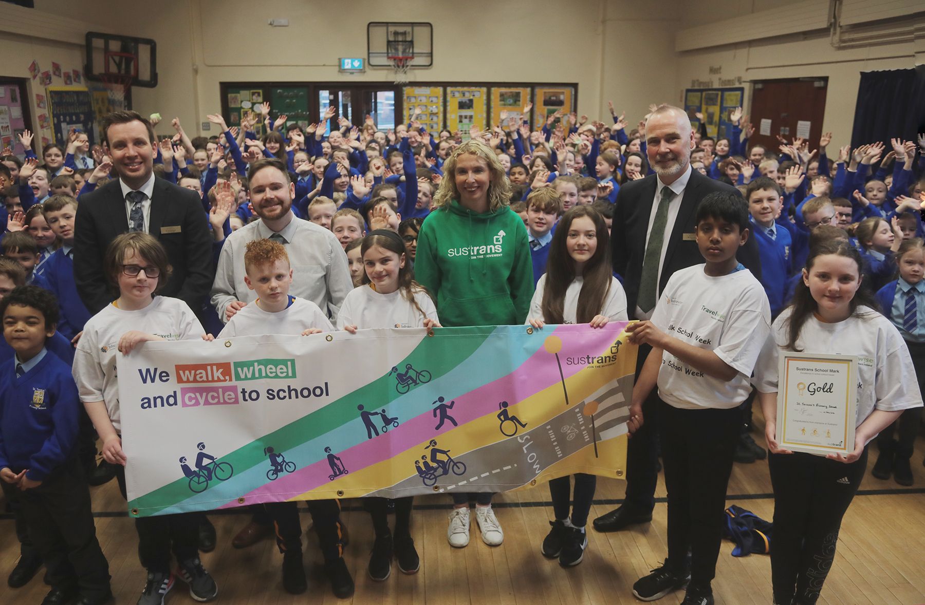 AWARD: Staff and pupils are presented with their Sustrans Gold Award