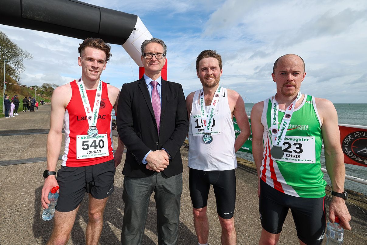 Kilwaughter Minerals CEO, Gary Wilmot, pictured with (L-R) third-place runner Jordan Heron, race winner Ed McGinley and second-place runner Chris Madden 