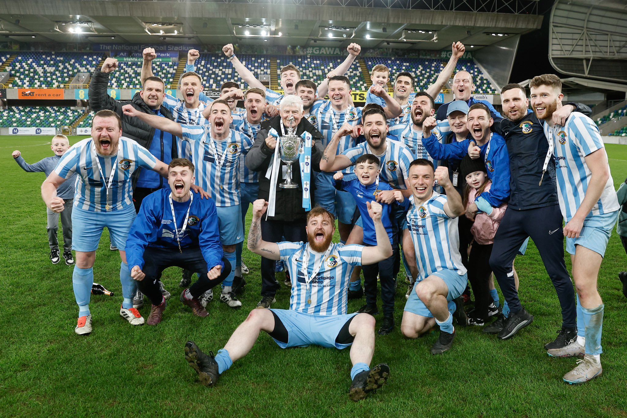 The Immaculata players celebrate their penalty shootout win over Crumlin Star at Windsor Park that landed a first Intermediate Cup success for the club 