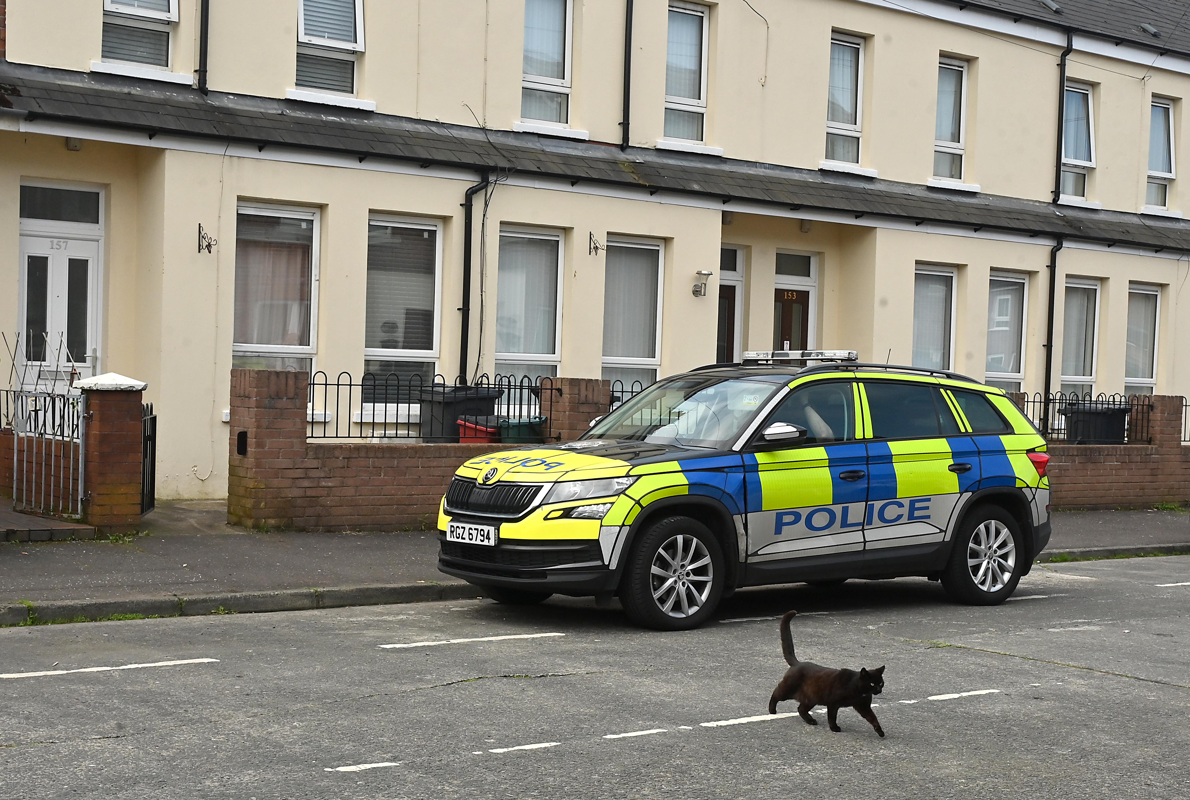 Murder investigation and three arrested after woman found dead
