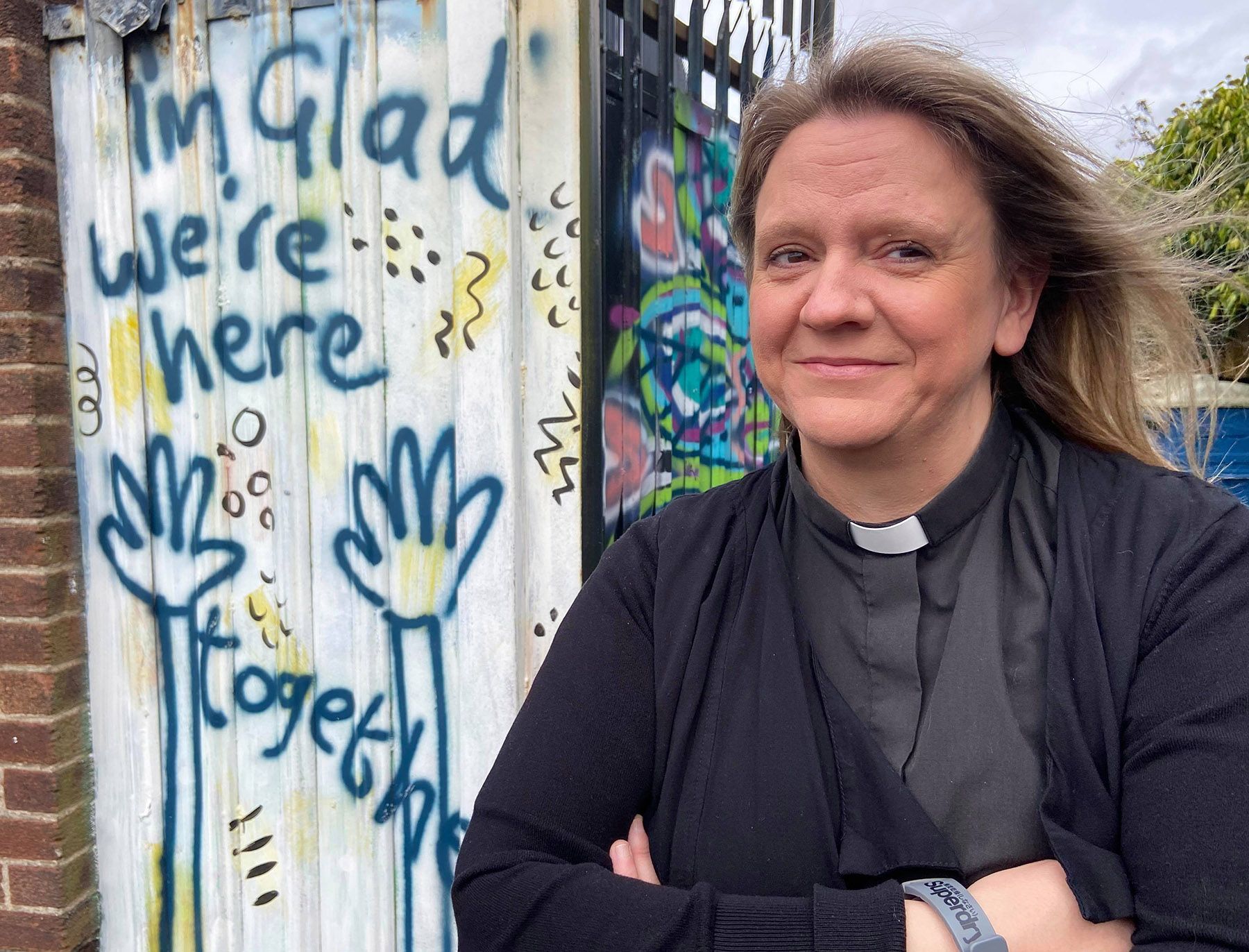 BE SURE TO WEAR FLOWERS IN YOUR HAIR: Rev Karen Sethurman on the peace line in West Belfast