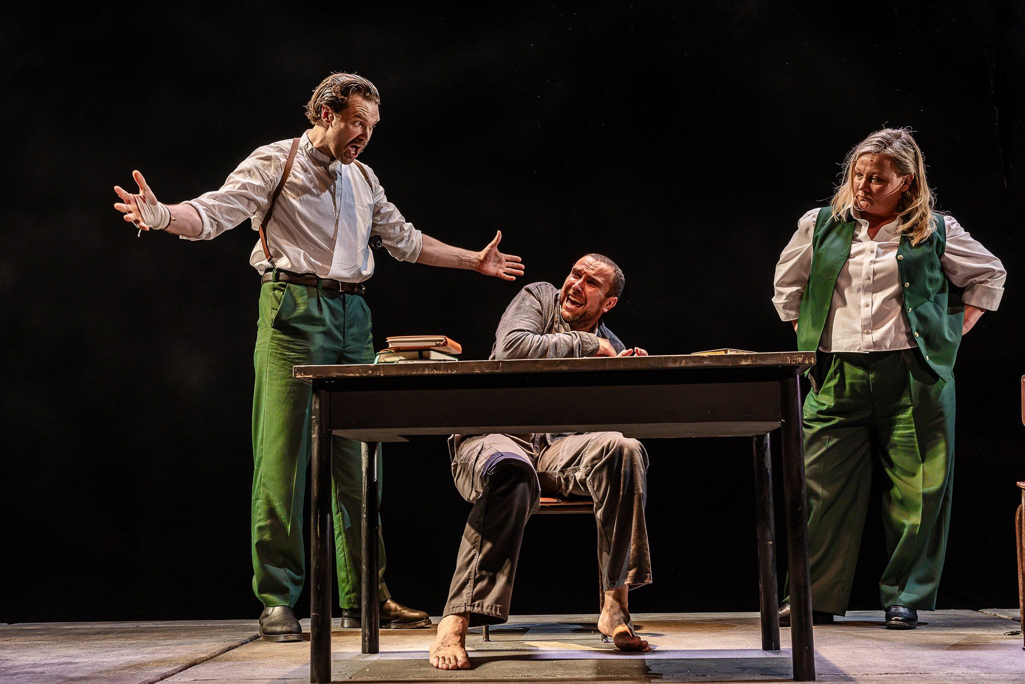 INTERROGATION: Steven Calvert as Ariel, left, Keith Singleton as Katurian and Abigail McGibbon as Tupolski