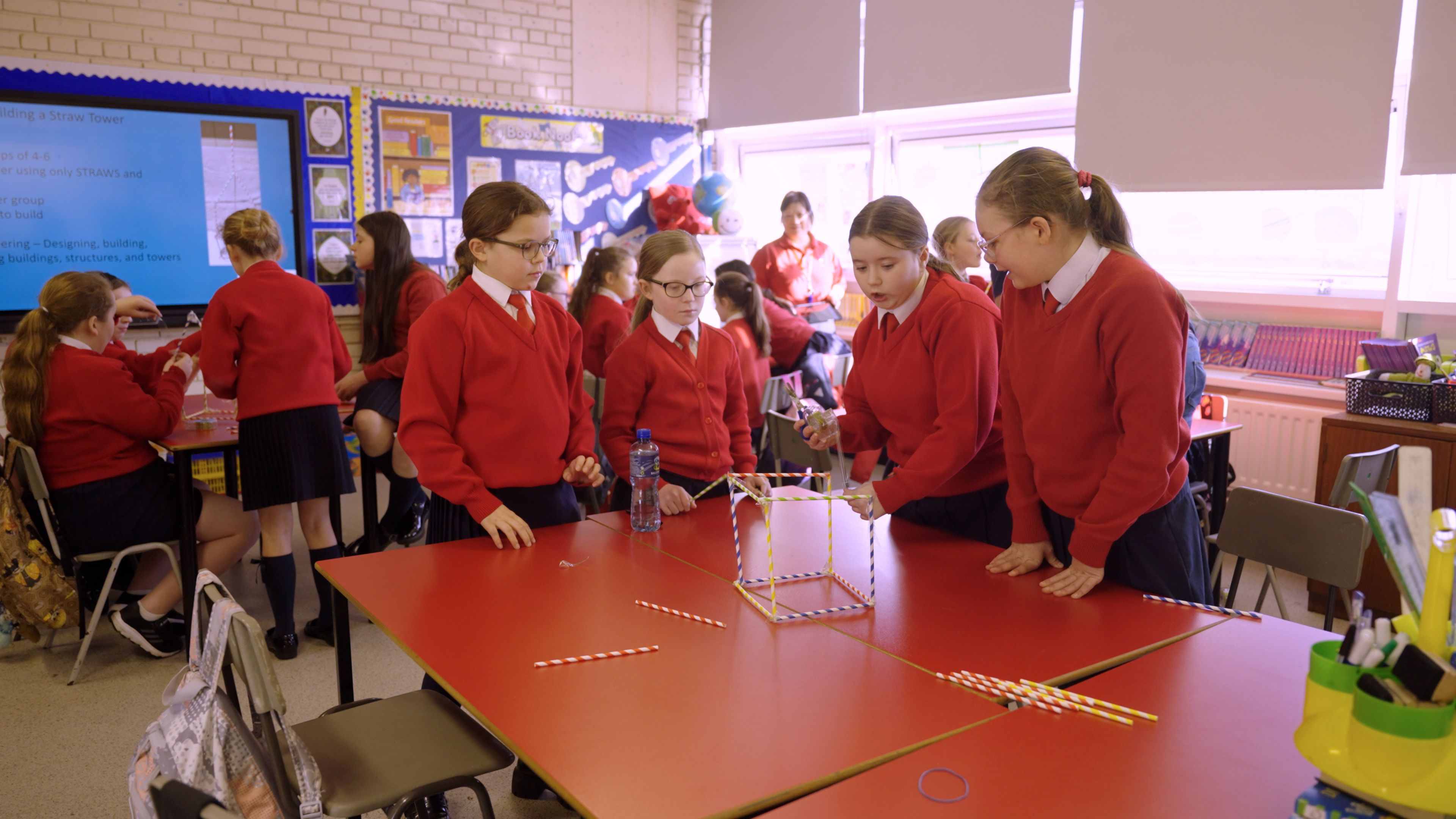 TEAMWORK: Things get serious in Holy Cross Girls’ School as students cooperate, compromise, and communicate effectively to complete their tasks