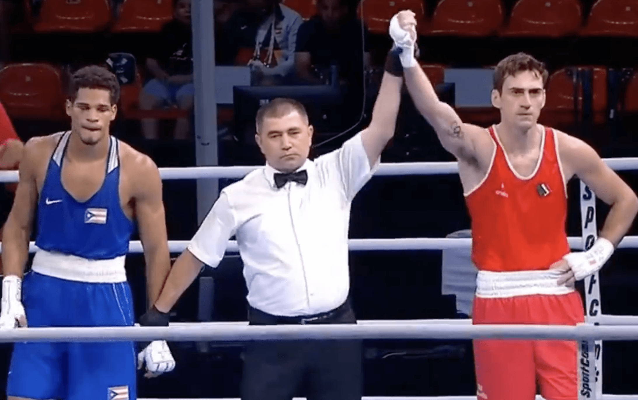 Aidan Walsh has his hand raised after his box-off final on Sunday 