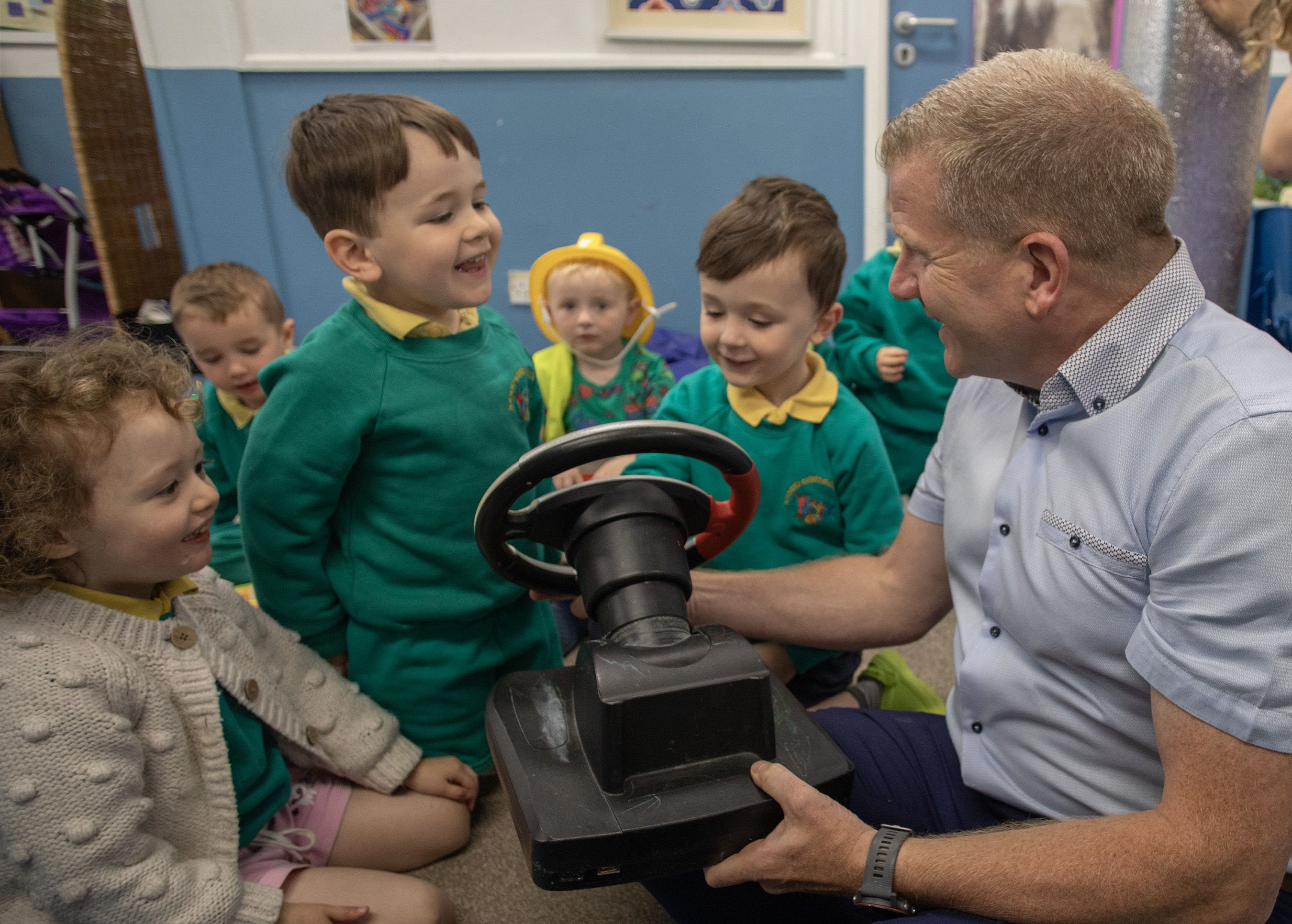 IRISH LANGUAGE LEARNING: NI Commissioner for Children and Young People, Chris Quinn meets with children at Ionad Uíbh Eachach