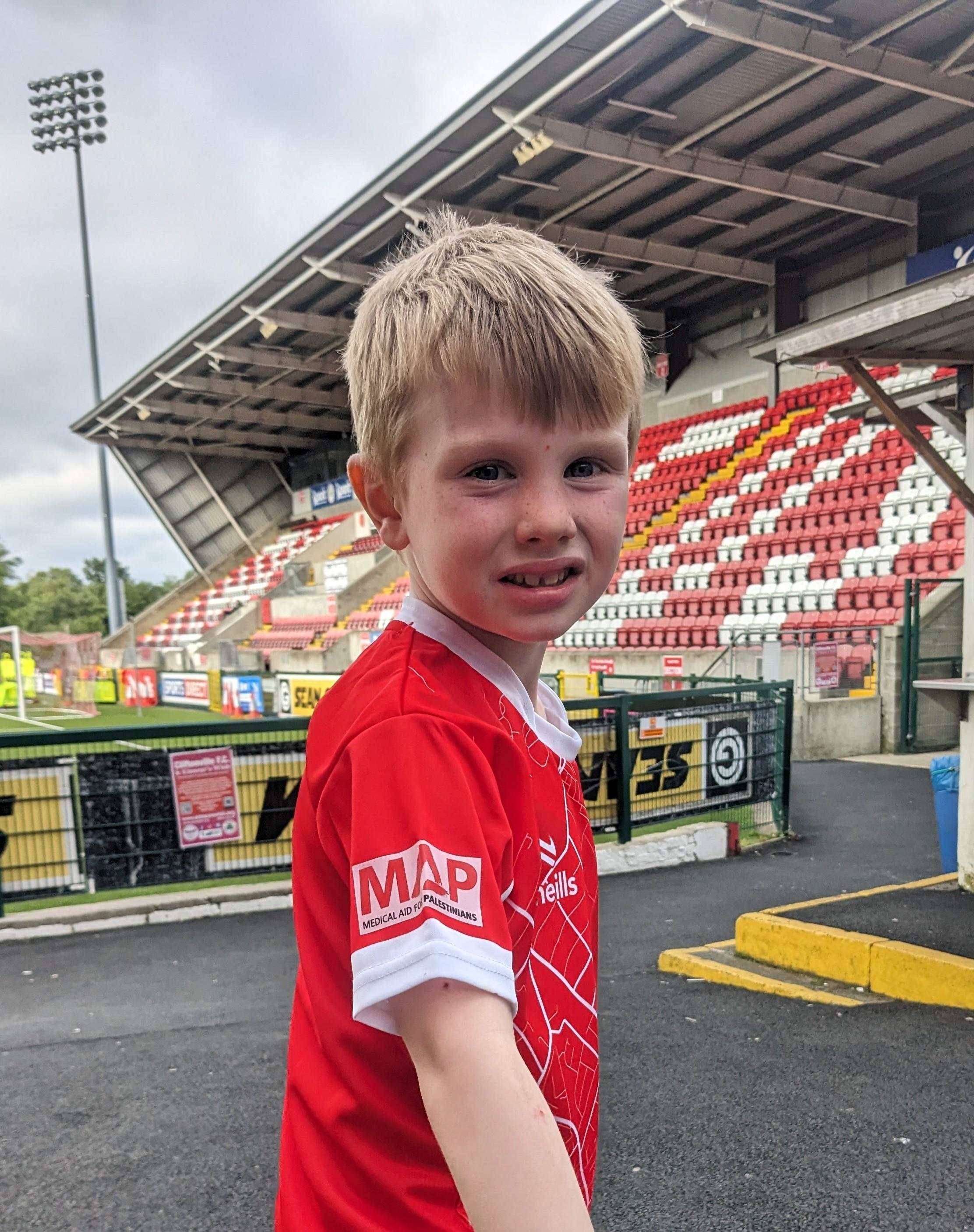 SUPPORT: Shahin Moore from Cliftonville 2017\'s shows off the MAP logo on the new jersey